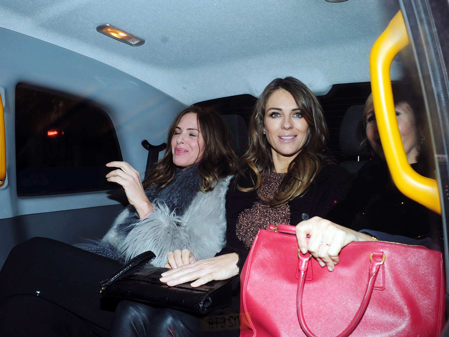 Liz Hurley out for a girls dinner at the Bulgari hotel