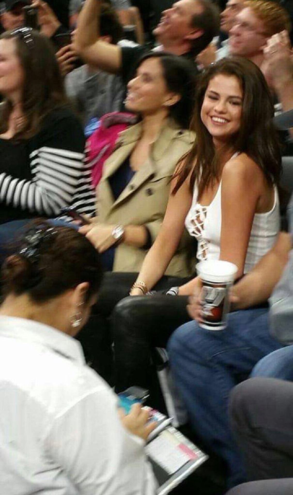 Selena Gomez attends the San Antonio Spurs vs LA Lakers basketball game