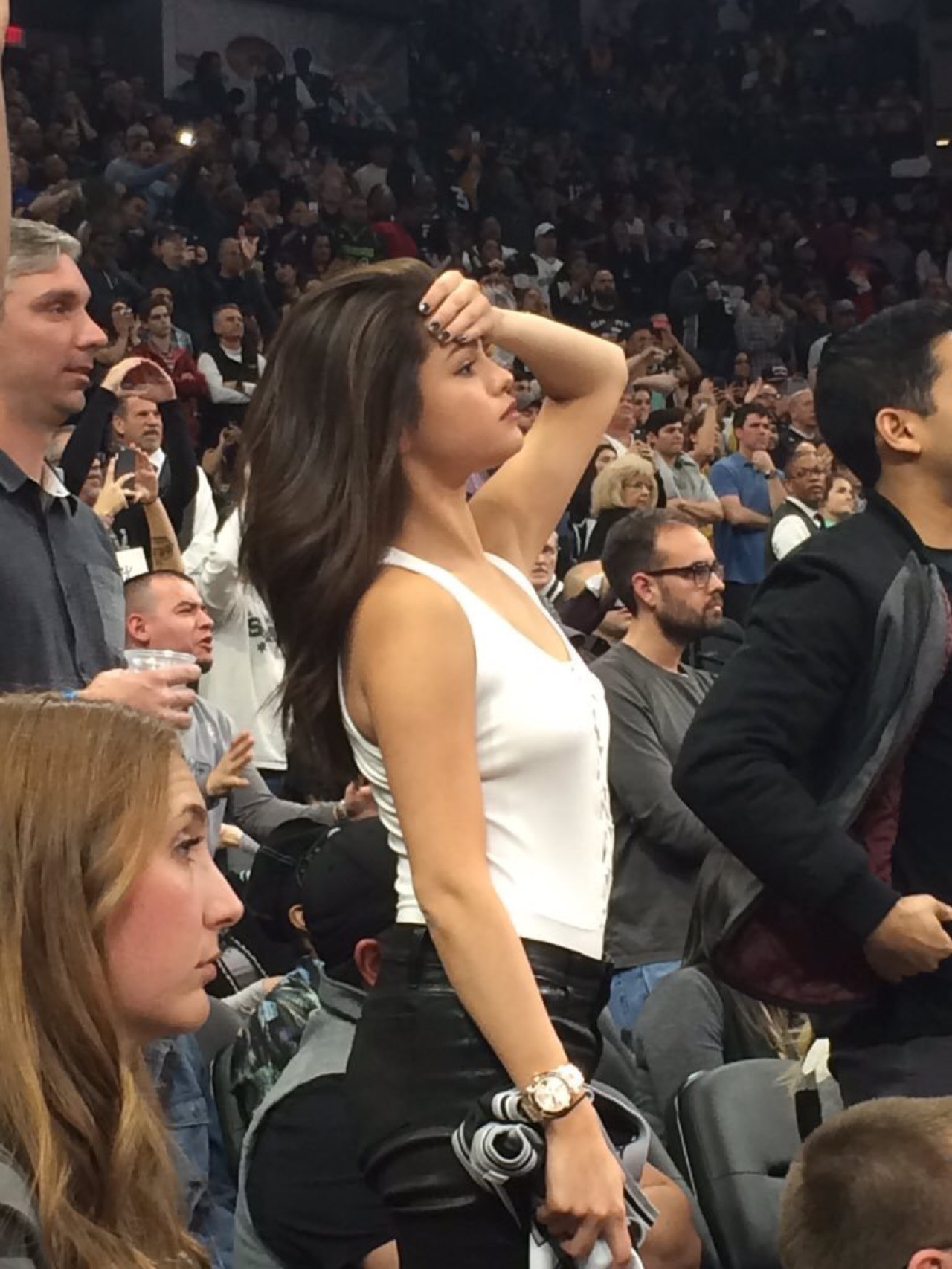 Selena Gomez attends the San Antonio Spurs vs LA Lakers basketball game