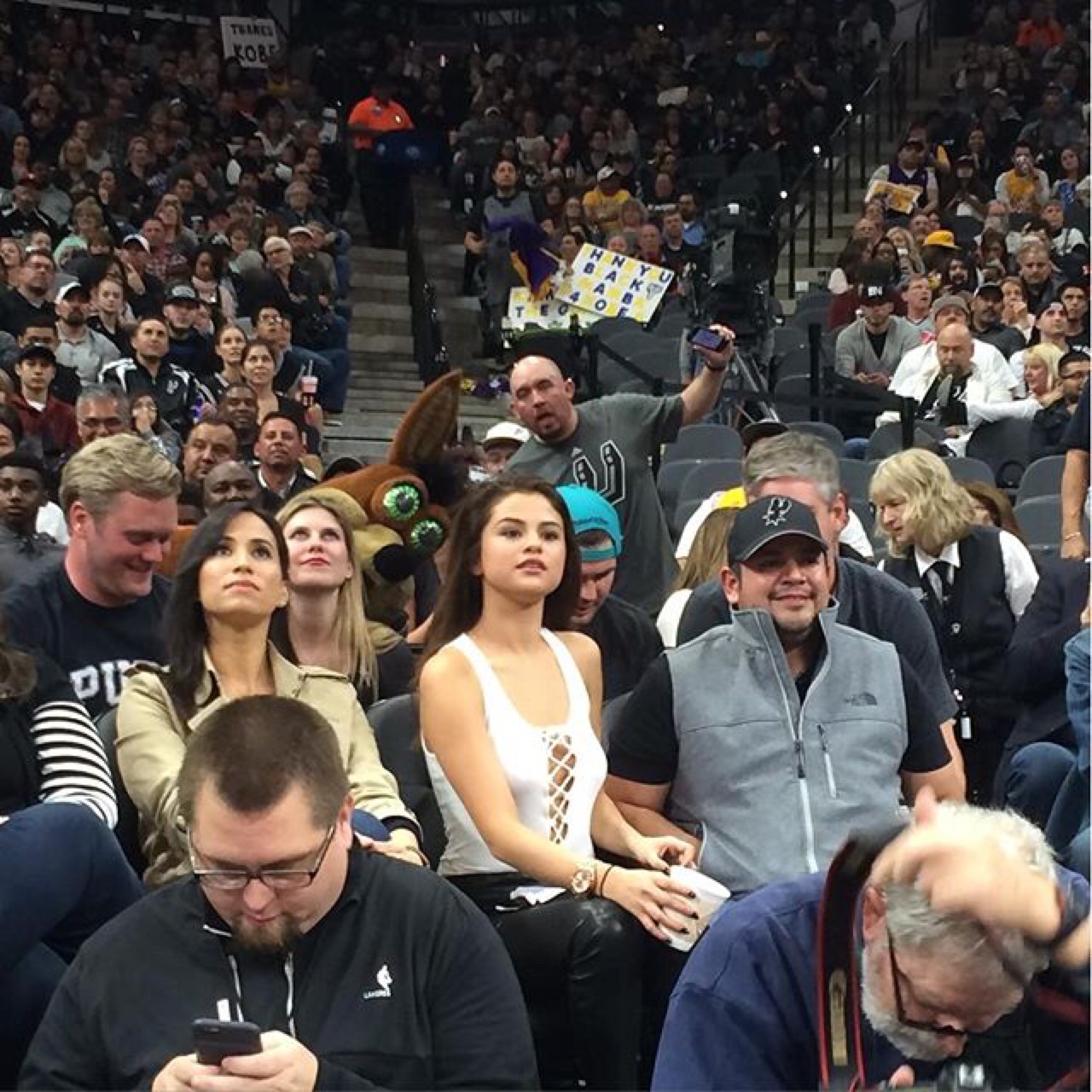 Selena Gomez attends the San Antonio Spurs vs LA Lakers basketball game