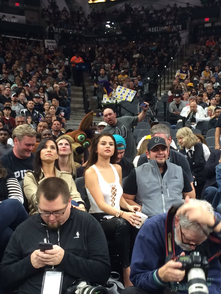 Selena Gomez attends the San Antonio Spurs vs LA Lakers basketball game