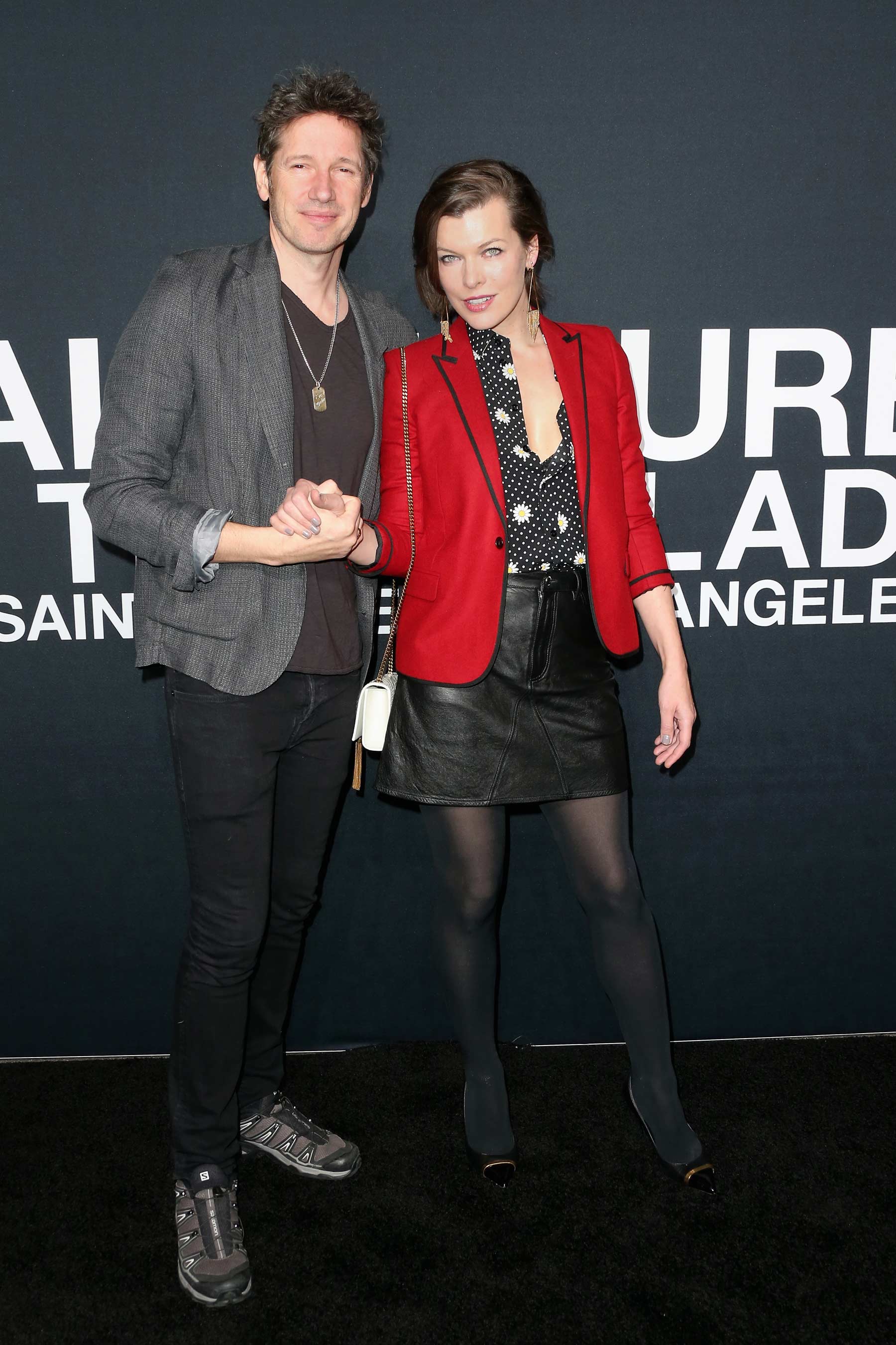 Milla Jovovich attends Saint Laurent show