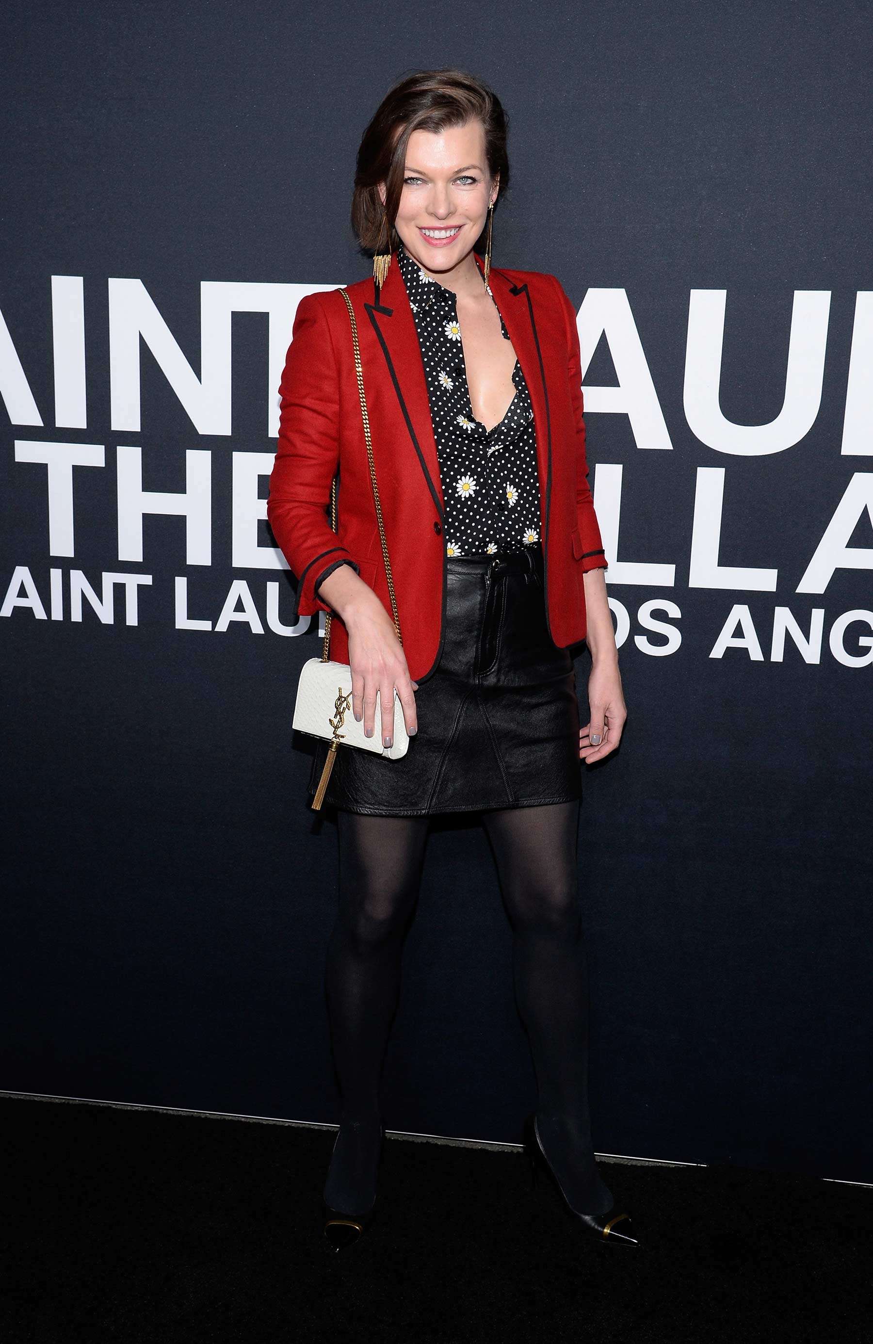 Milla Jovovich attends Saint Laurent show