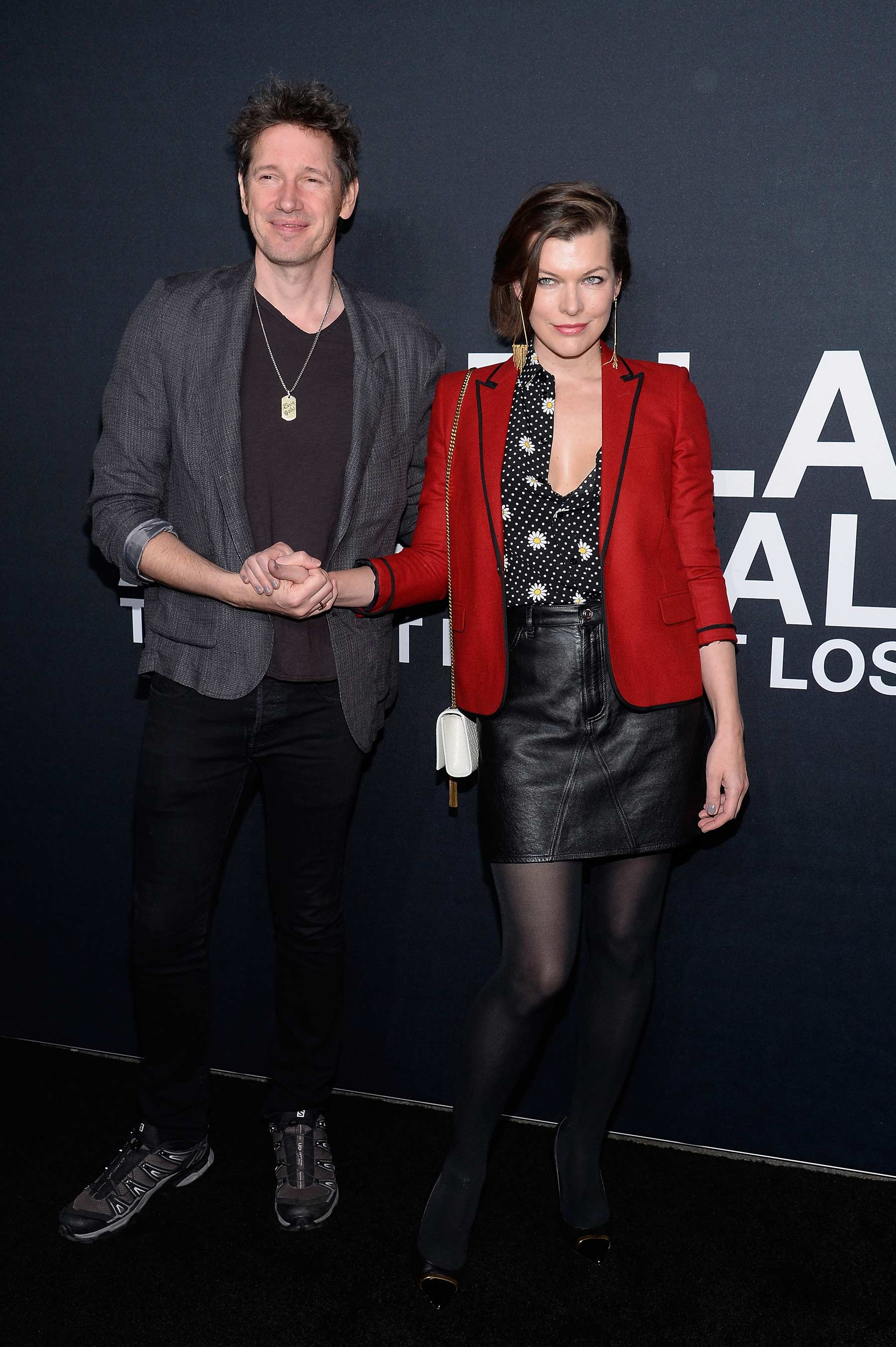 Milla Jovovich attends Saint Laurent show