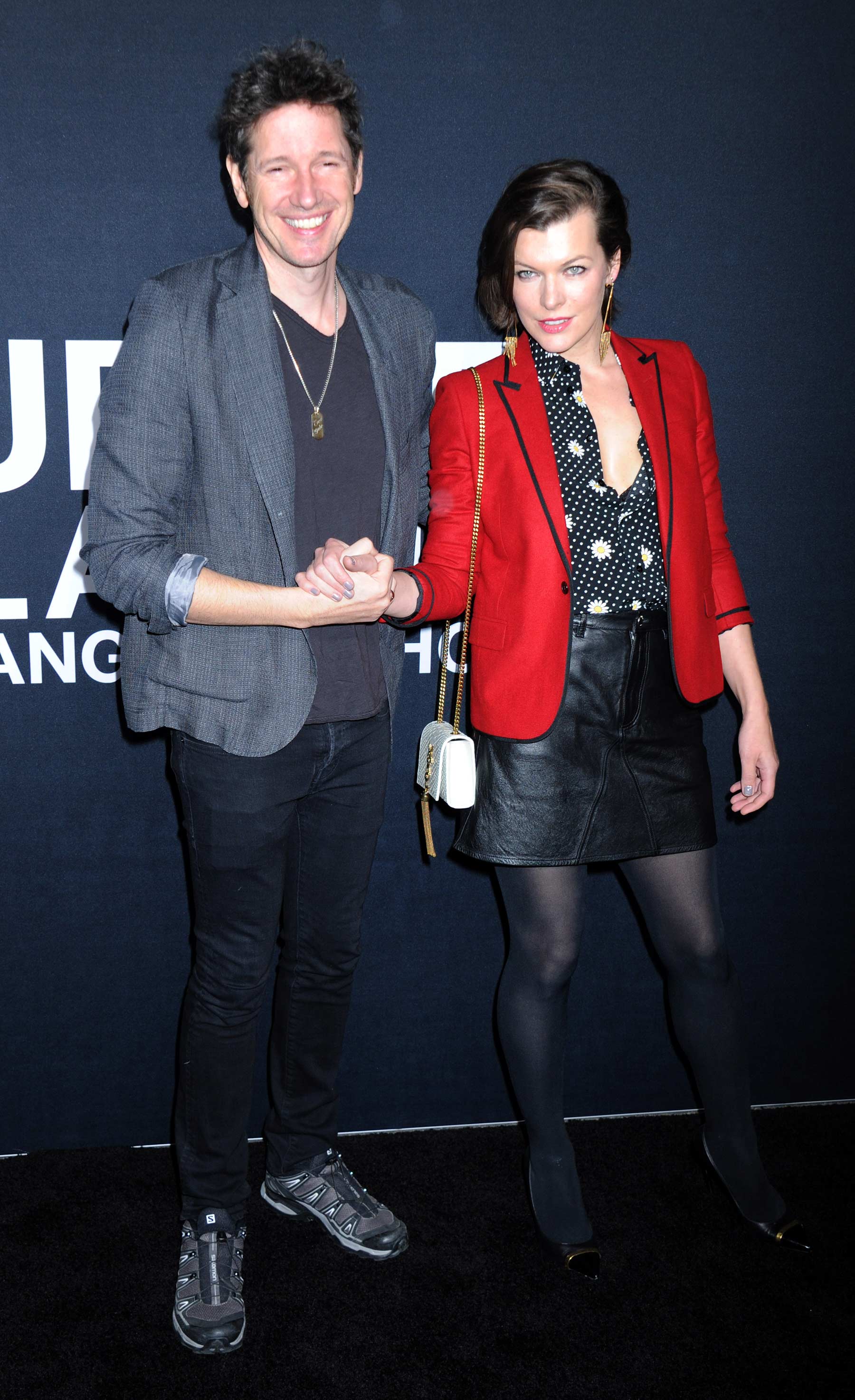 Milla Jovovich attends Saint Laurent show