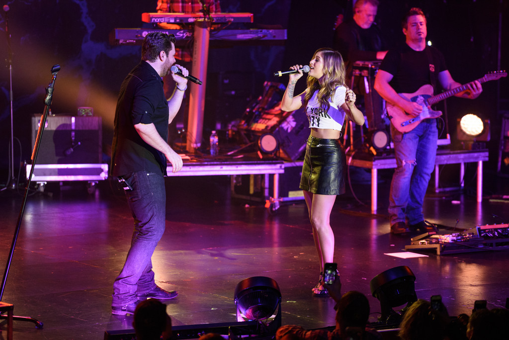 Cassadee Pope performs on stage for the I’m Comin’ Over Tour