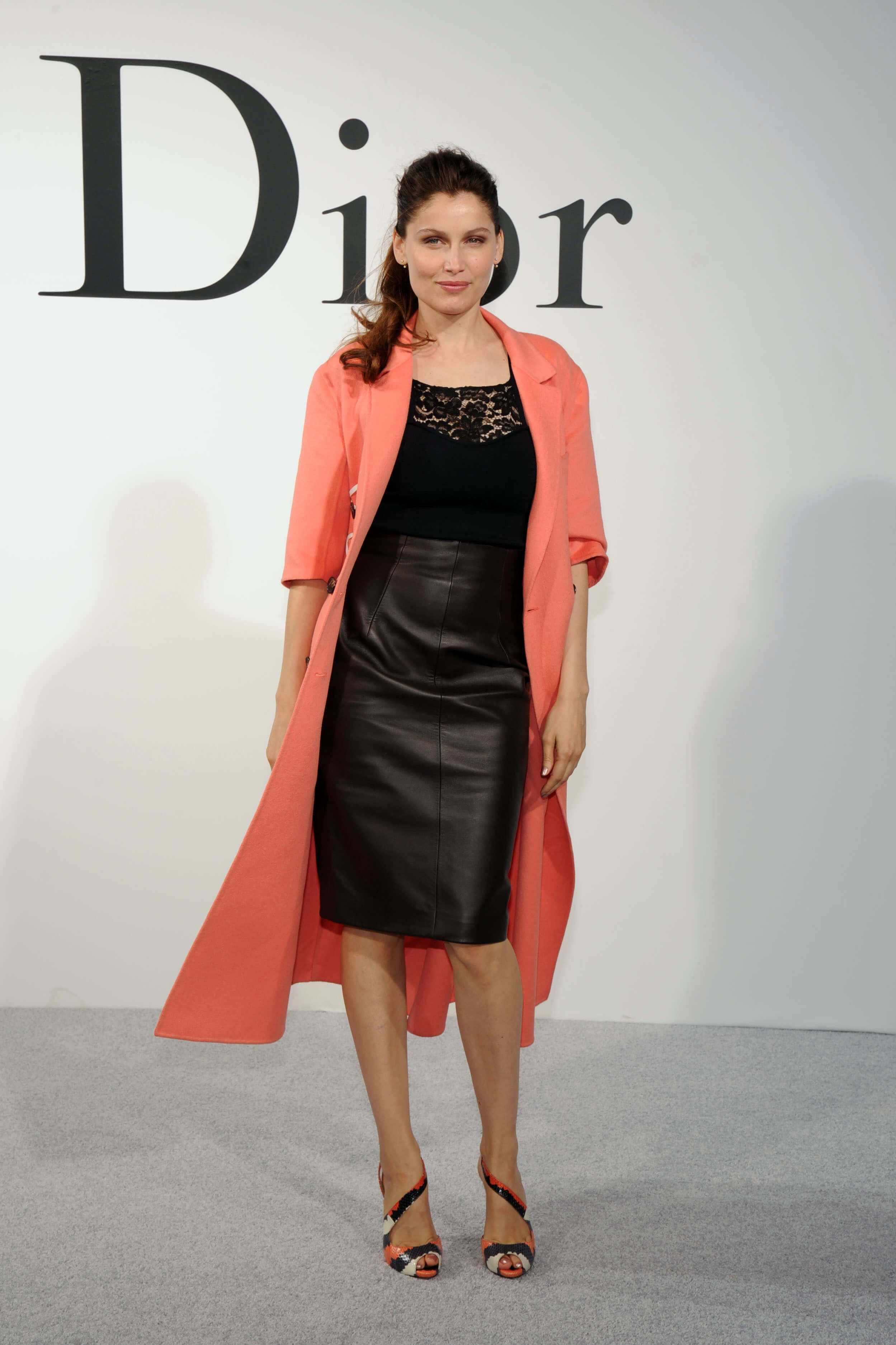 Laetitia Casta at the Christian Dior show during Paris Fashion Week