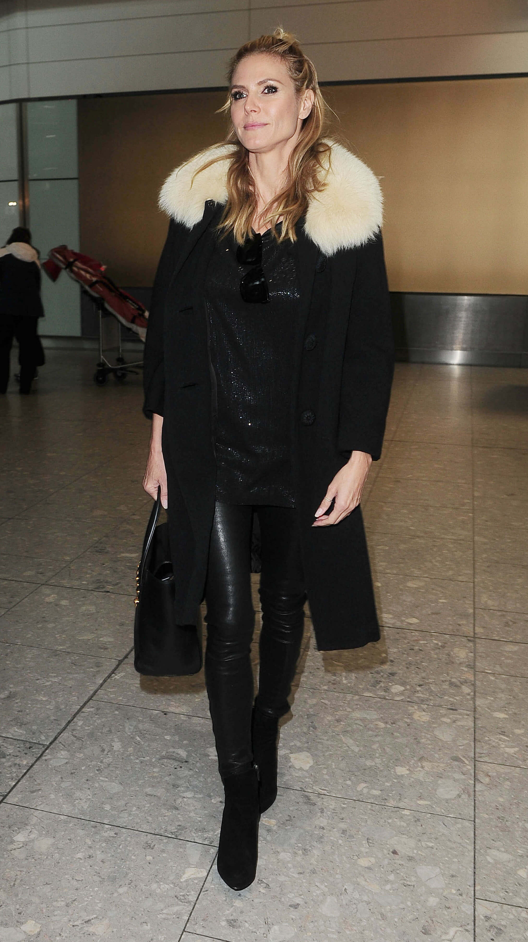 Heidi Klum at Heathrow airport