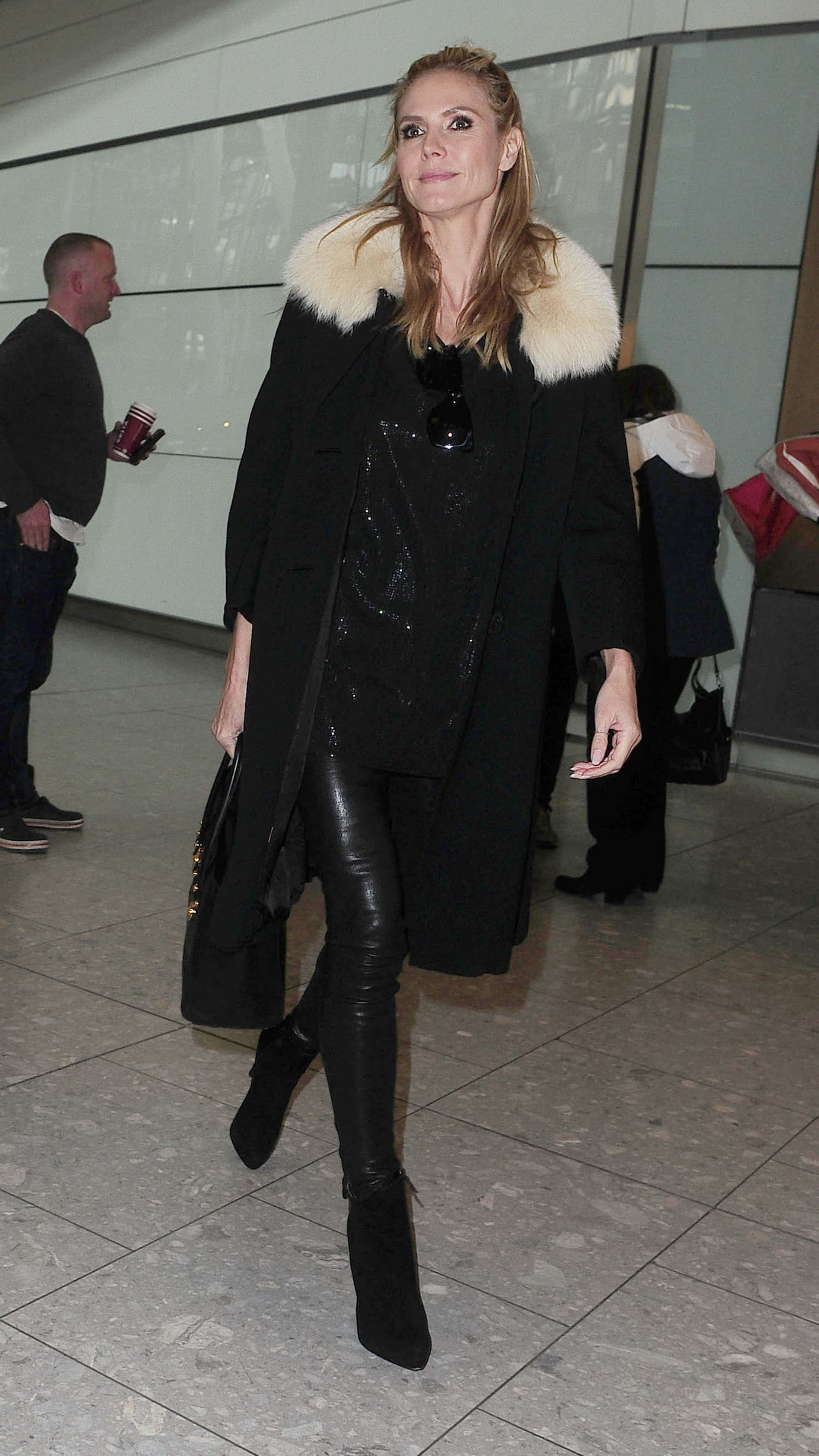 Heidi Klum at Heathrow airport