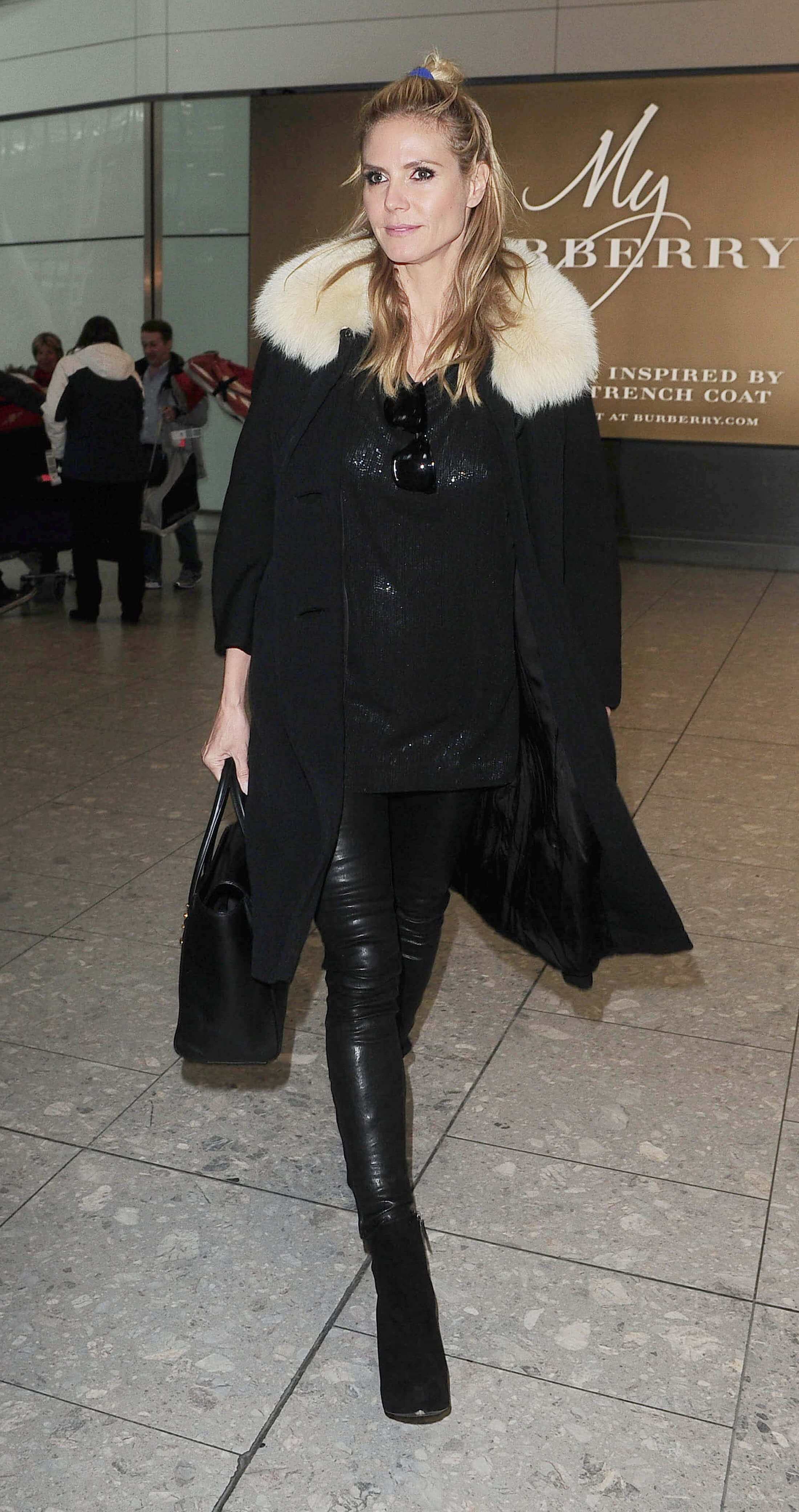 Heidi Klum at Heathrow airport