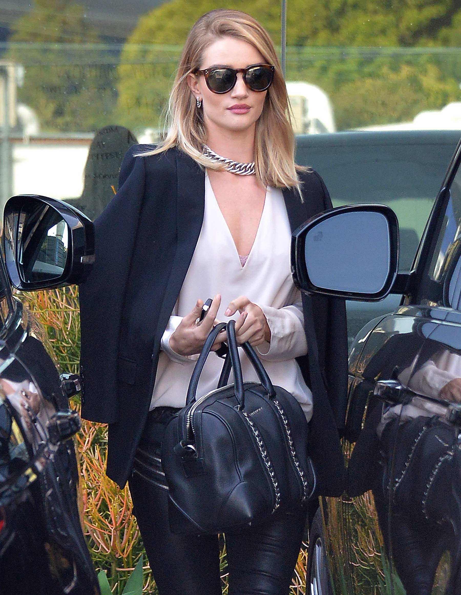 Rosie Huntington Whiteley leaves her Office