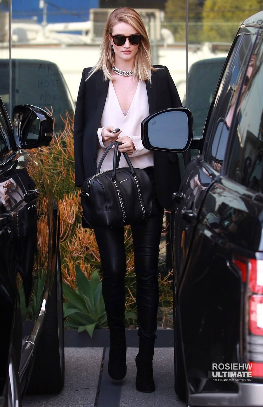 Rosie Huntington Whiteley leaves her Office