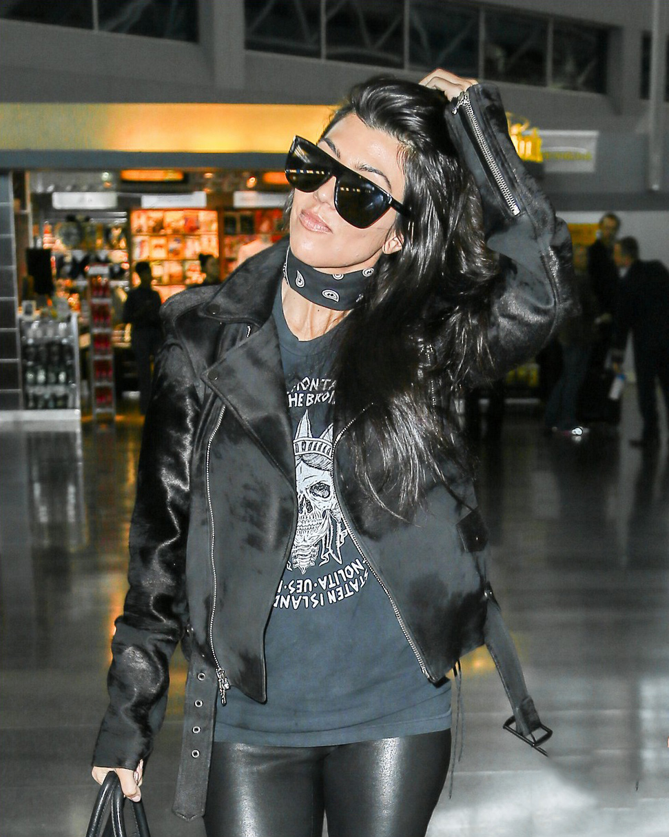 Kourtney Kardashian is seen at LAX and JFK airports