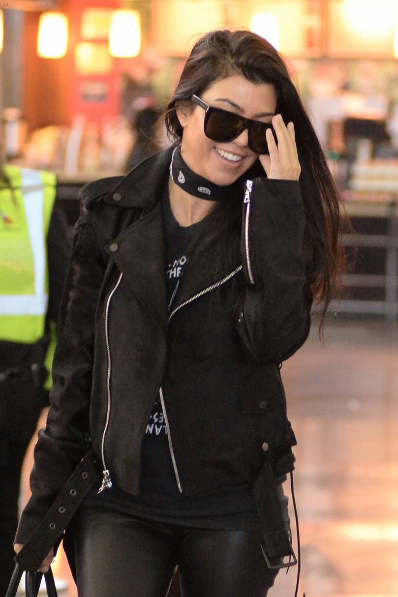 Kourtney Kardashian is seen at LAX and JFK airports