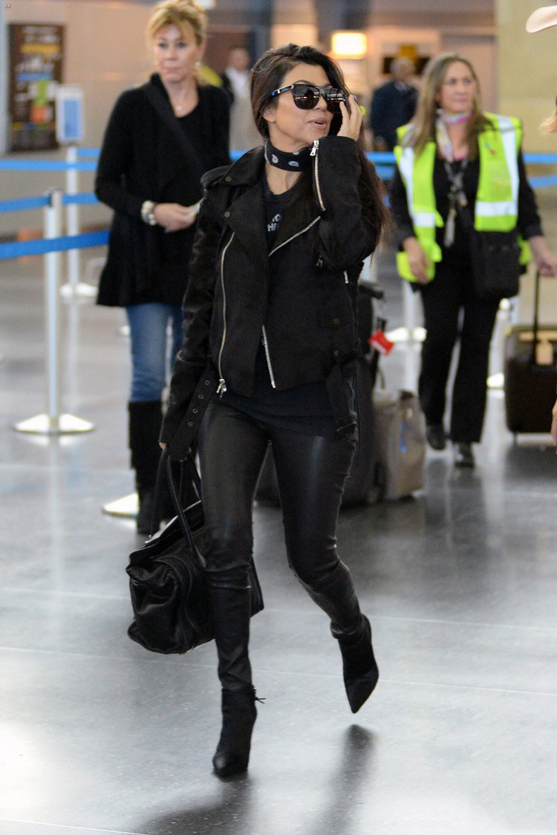 Kourtney Kardashian is seen at LAX and JFK airports