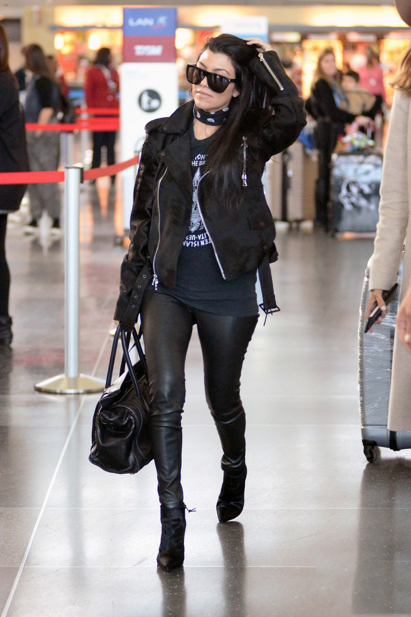 Kourtney Kardashian is seen at LAX and JFK airports