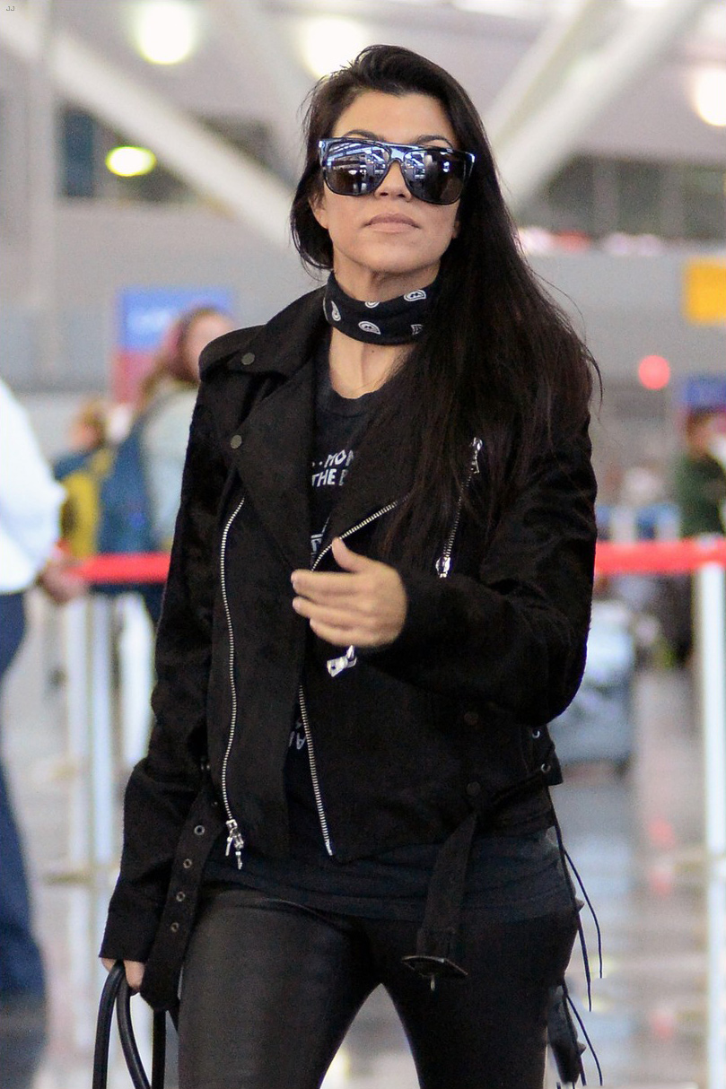 Kourtney Kardashian is seen at LAX and JFK airports