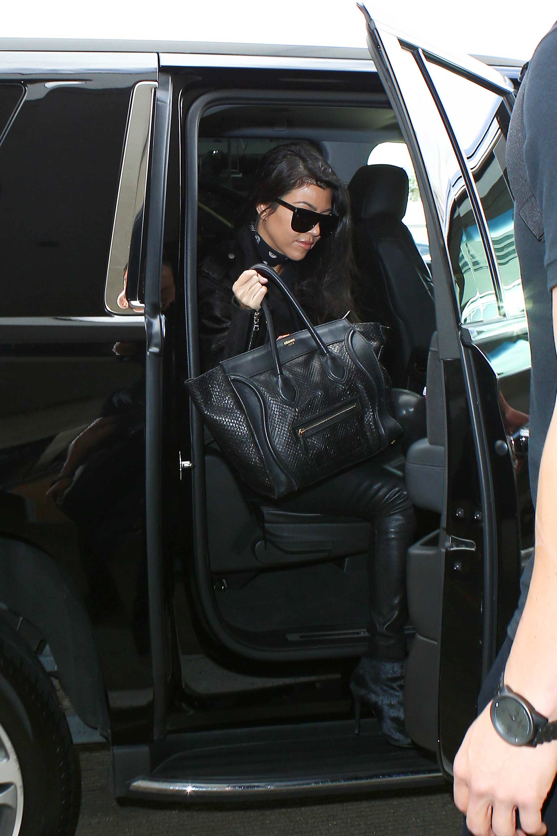 Kourtney Kardashian is seen at LAX and JFK airports