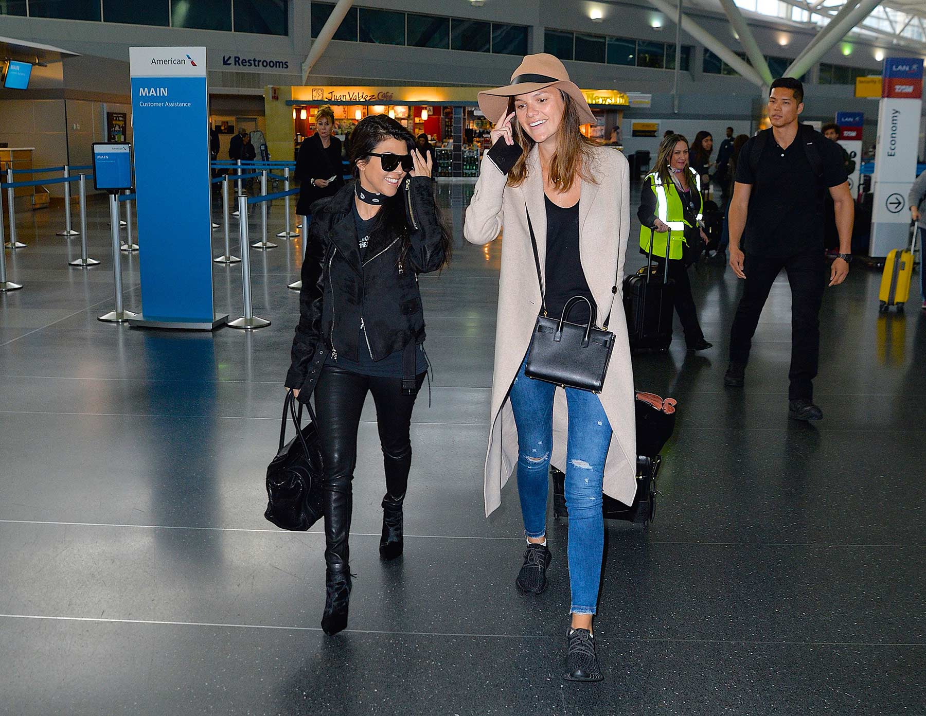 Kourtney Kardashian is seen at LAX and JFK airports