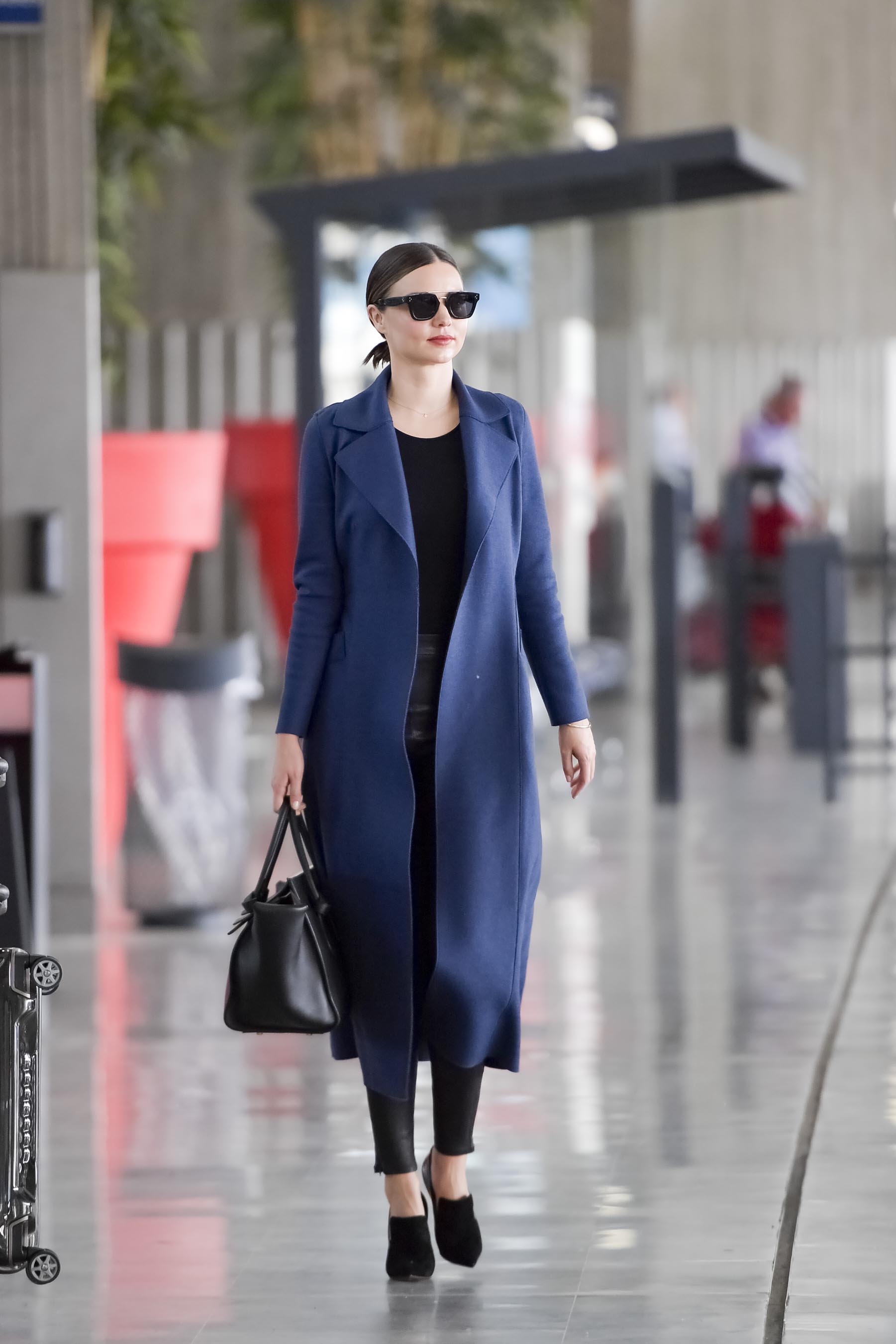 Miranda Kerr at LAX & Charles de Gaulle Airport