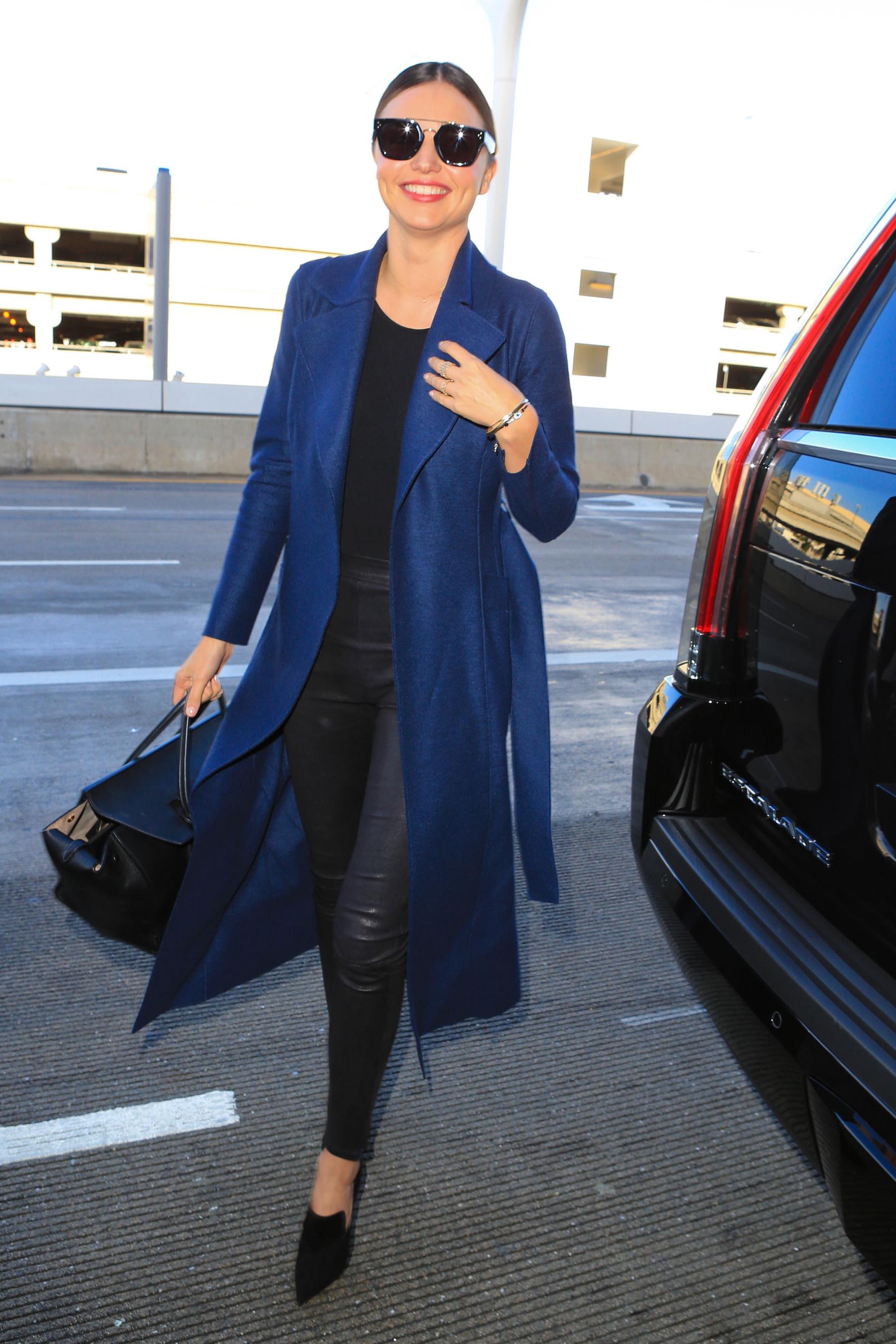 Miranda Kerr at LAX & Charles de Gaulle Airport