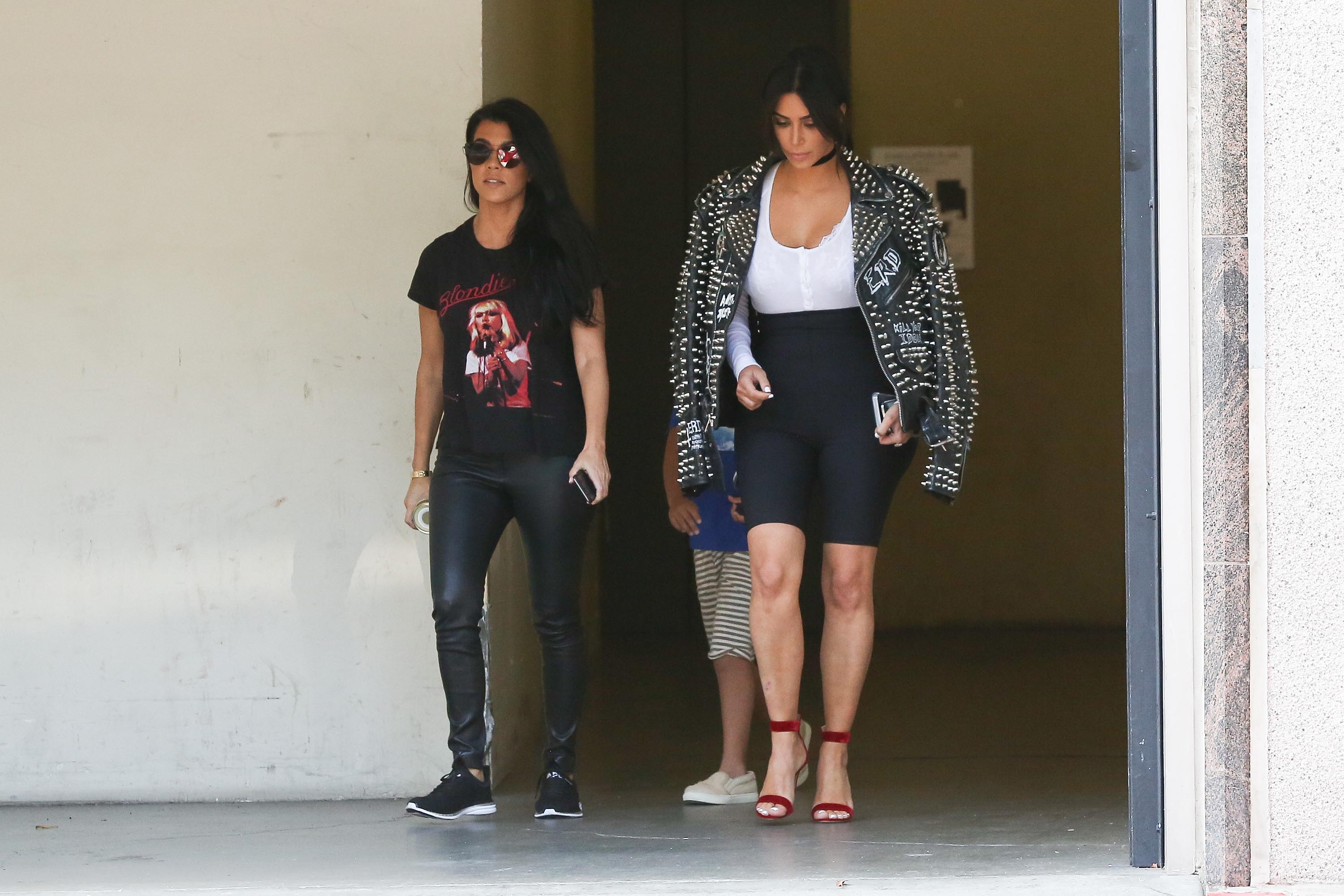 Kourtney Kardashian is seen leaving a meeting