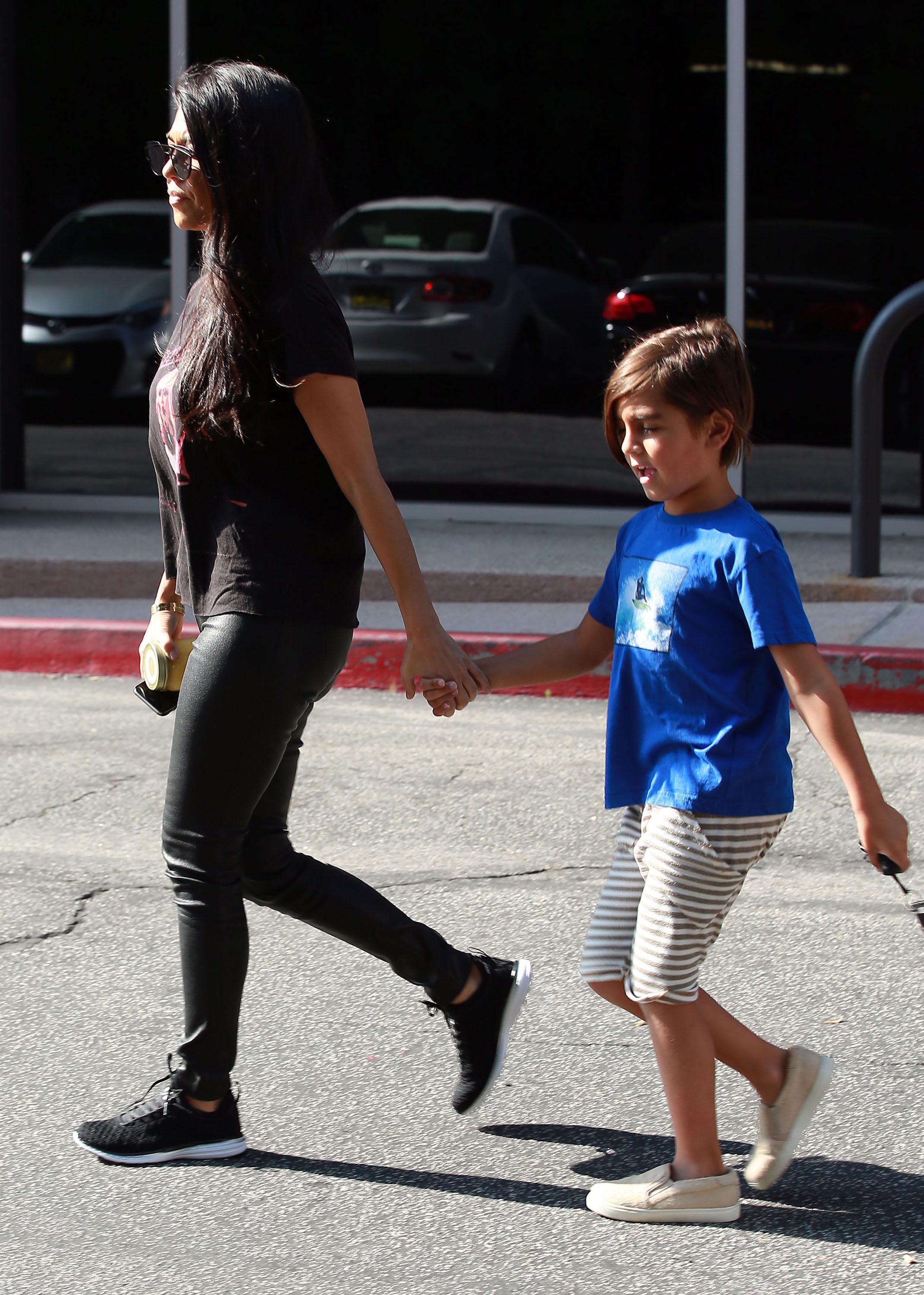 Kourtney Kardashian is seen leaving a meeting