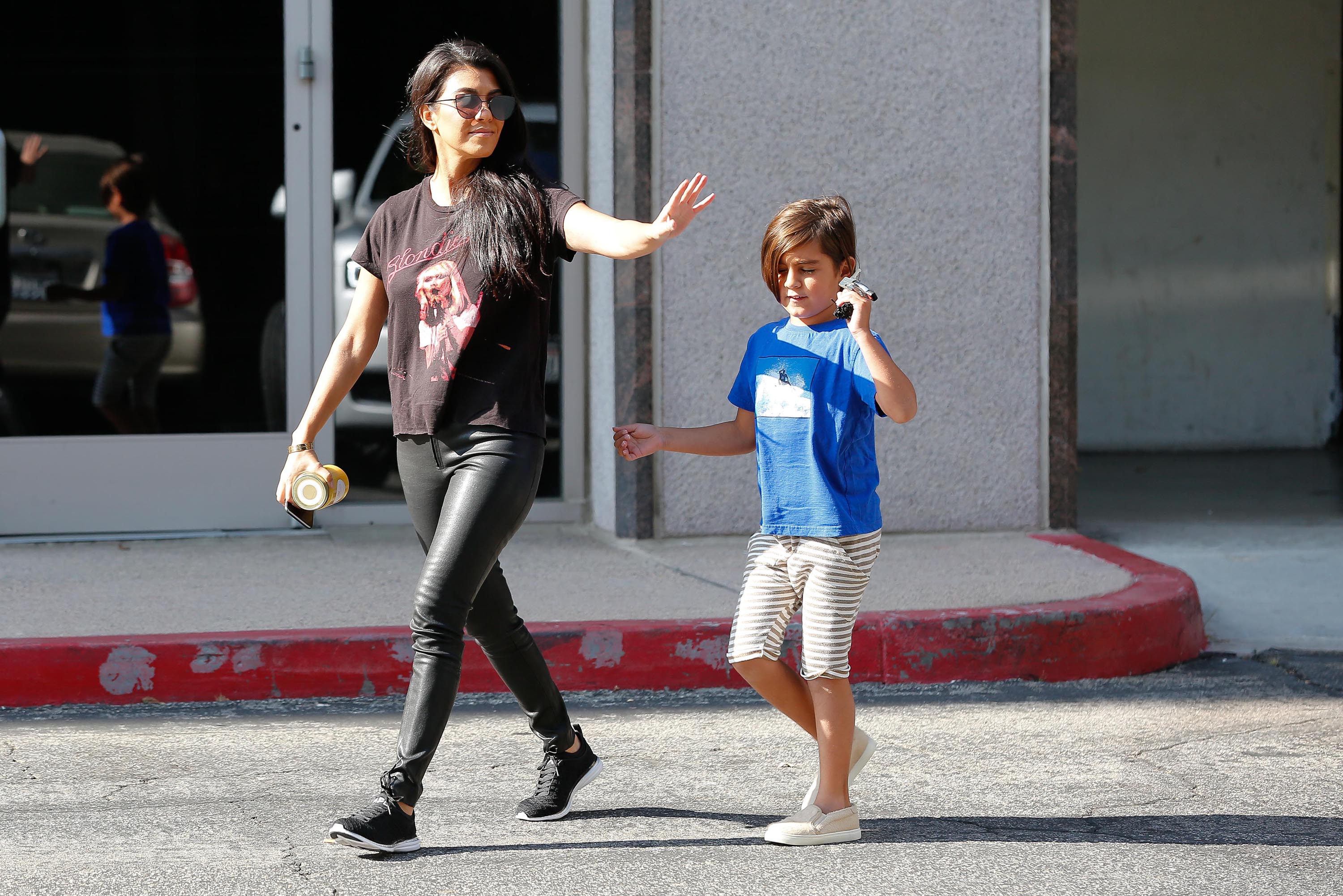 Kourtney Kardashian is seen leaving a meeting