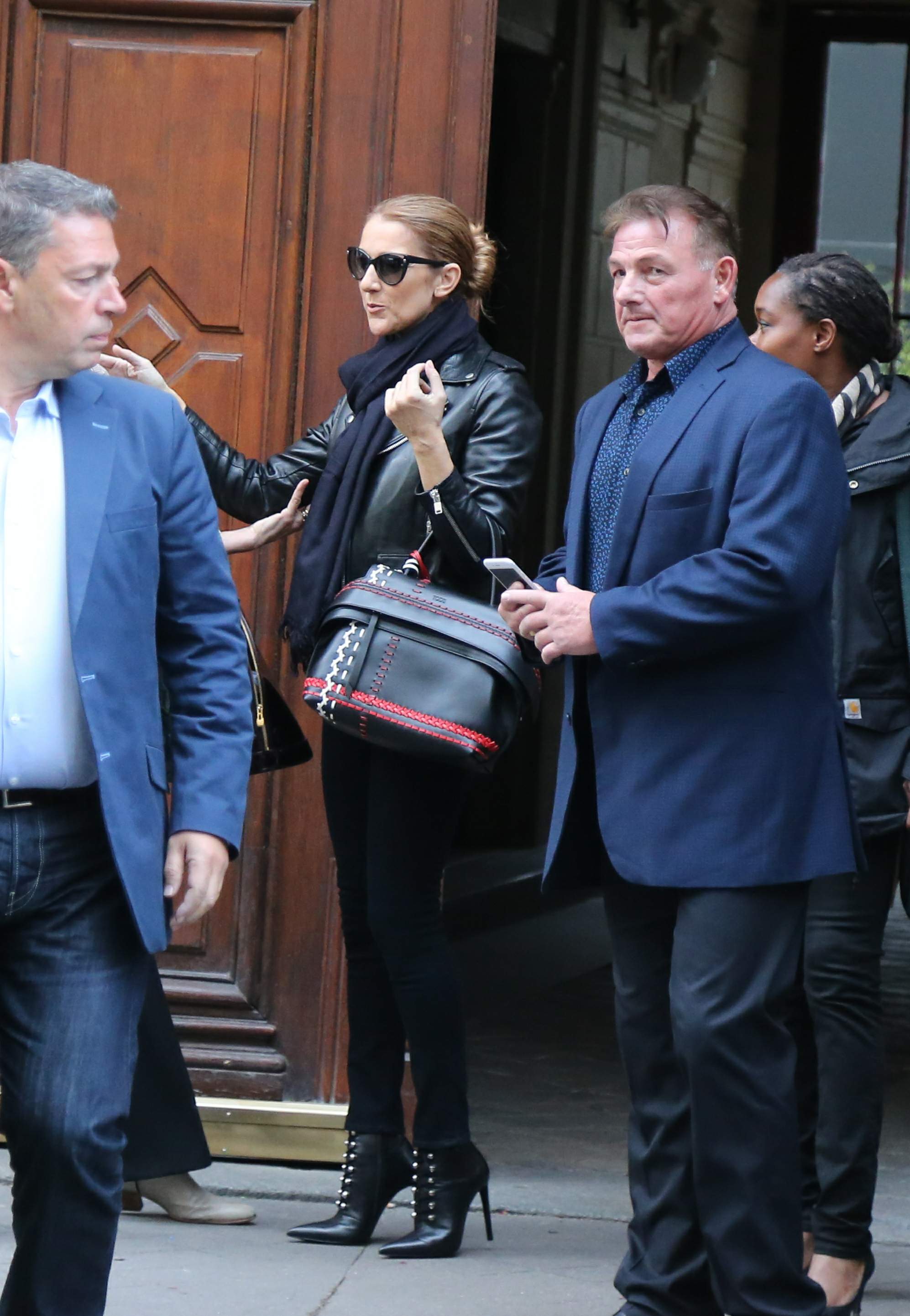 Celine Dion leaves her hotel to do a photoshoot