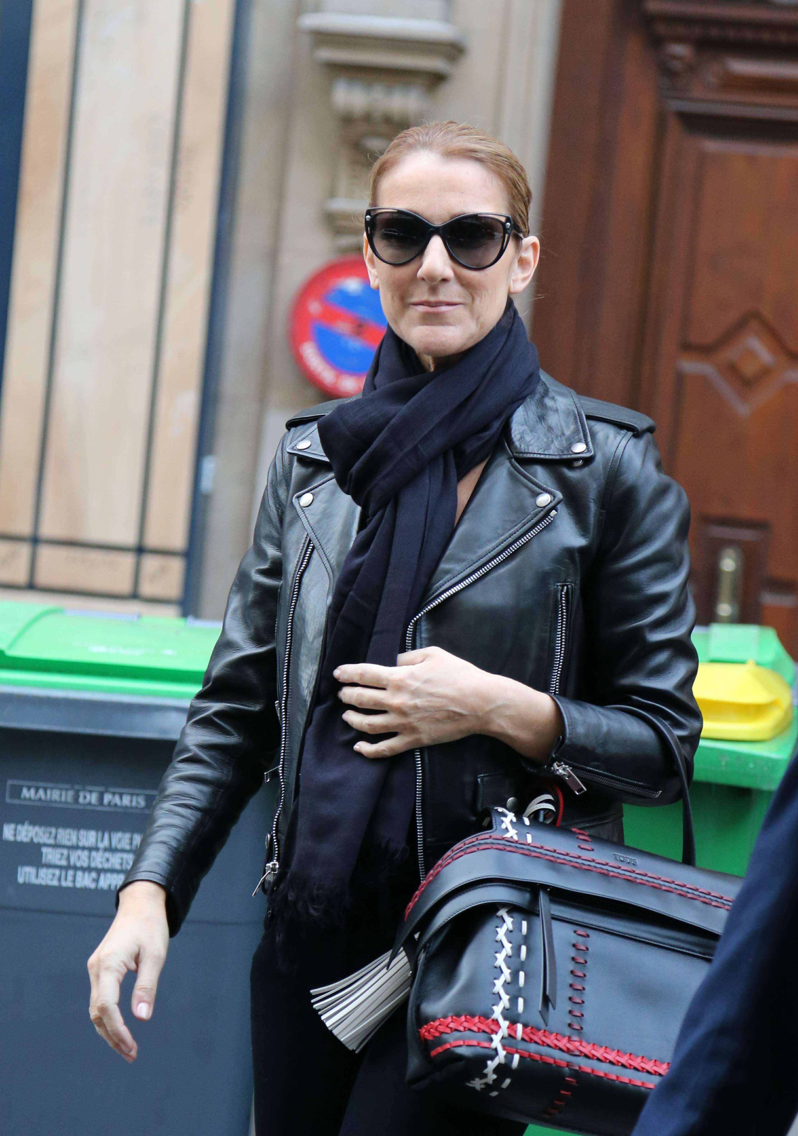 Celine Dion leaves her hotel to do a photoshoot