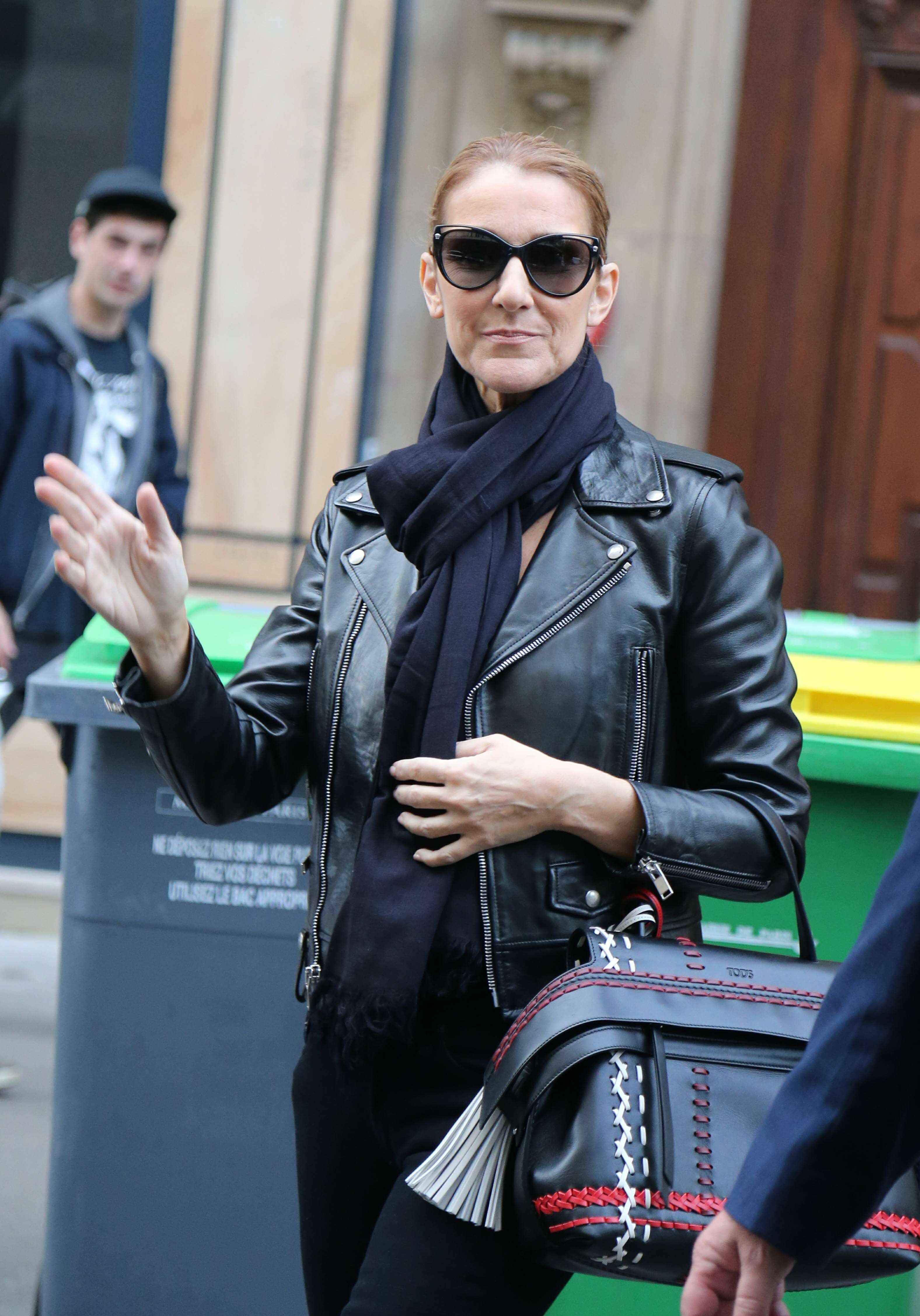 Celine Dion leaves her hotel to do a photoshoot