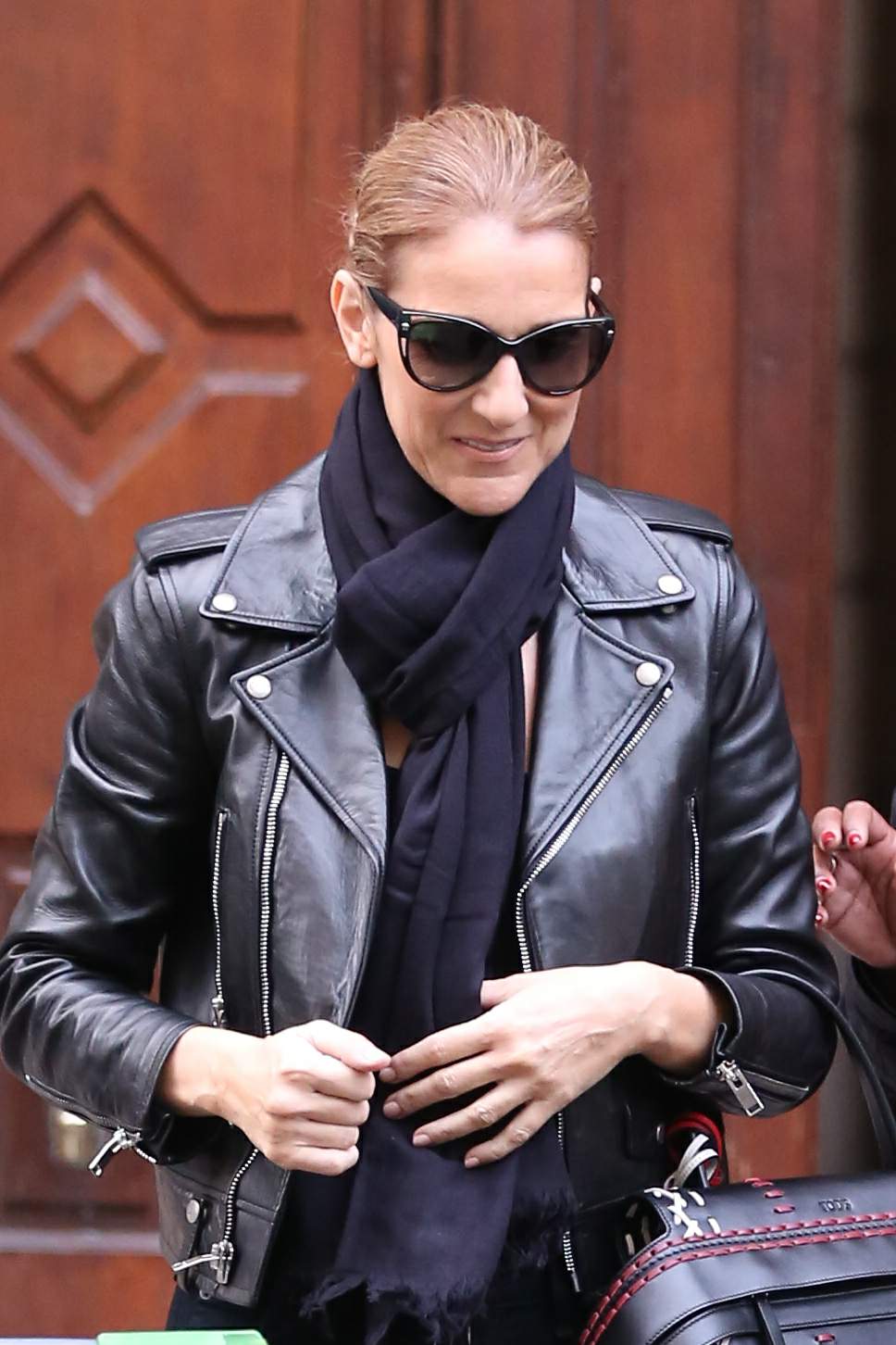 Celine Dion leaves her hotel to do a photoshoot