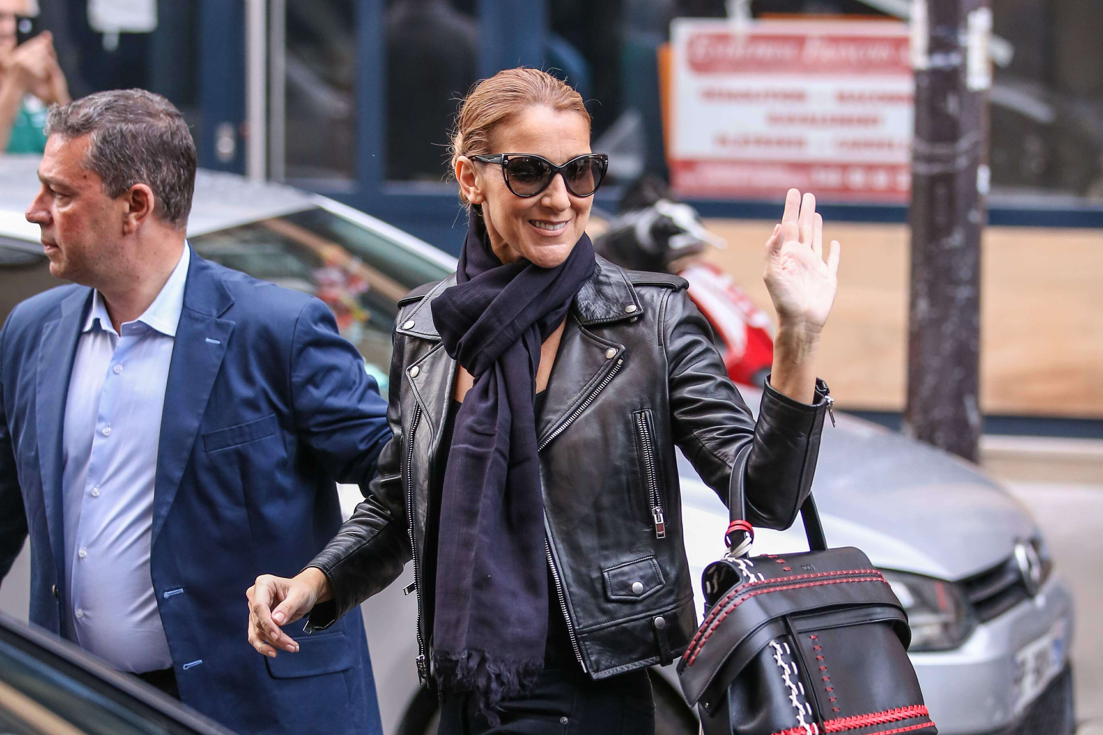 Celine Dion leaves her hotel to do a photoshoot