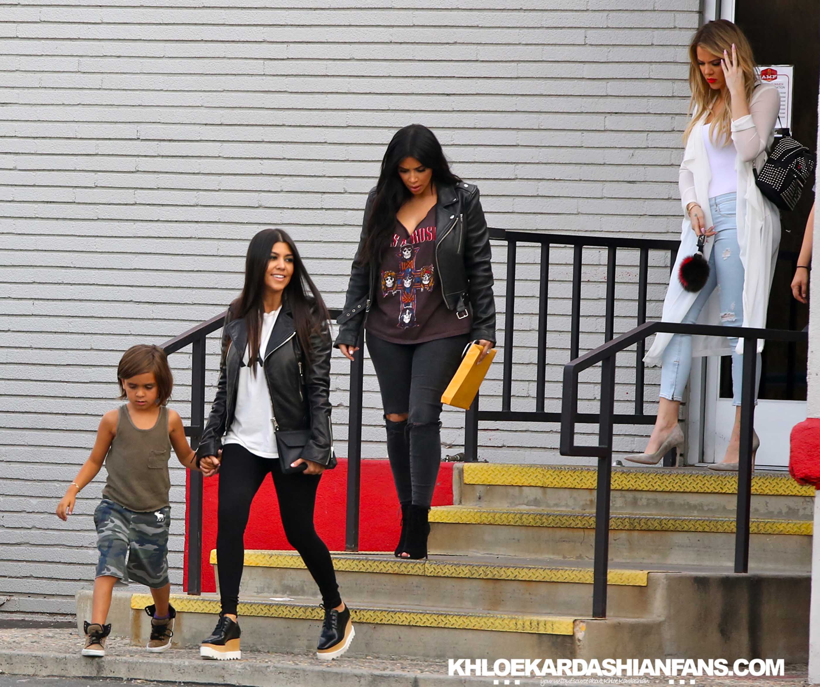 Khloe, Kim, Kourtney and Kylie at a bowling