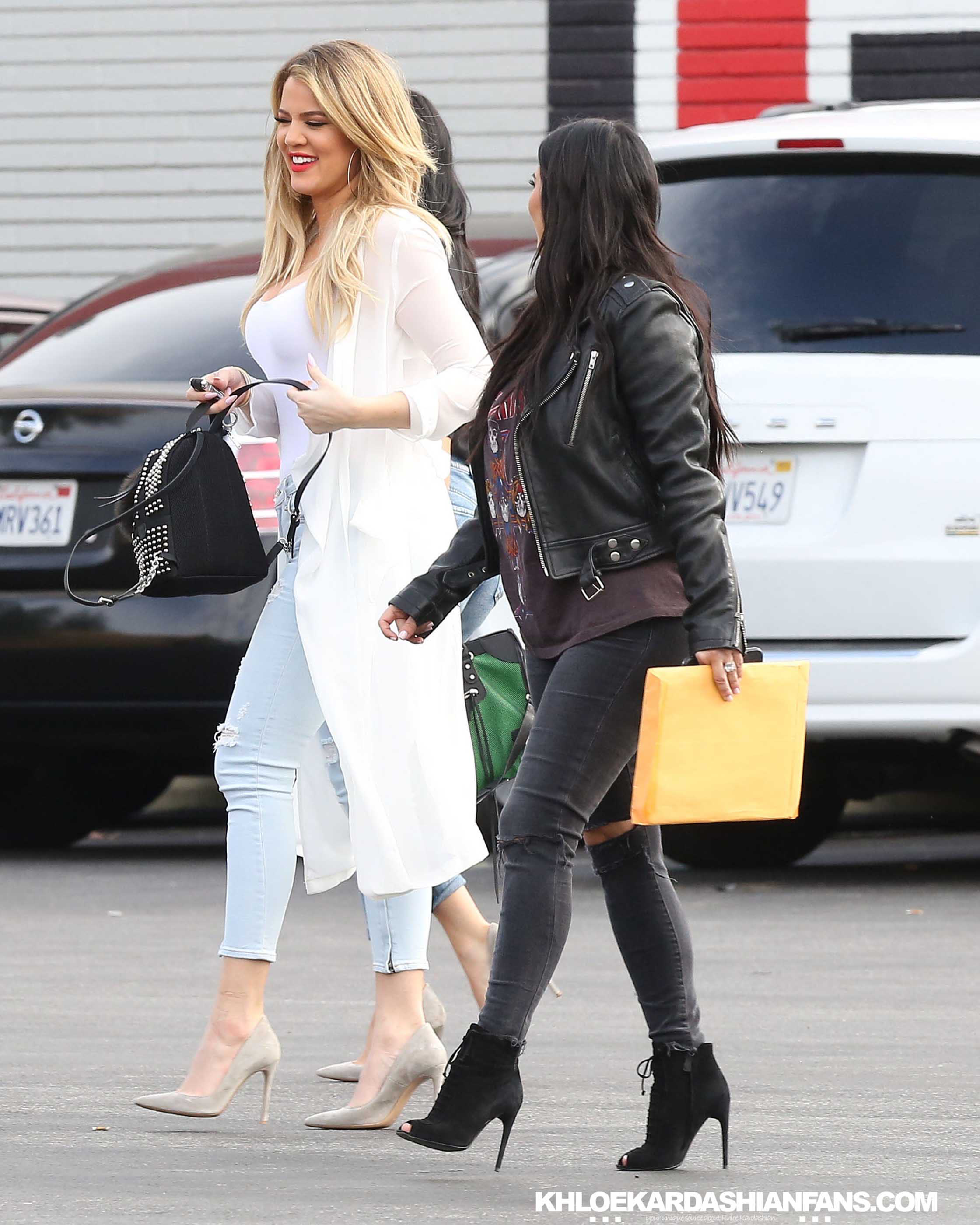 Khloe, Kim, Kourtney and Kylie at a bowling