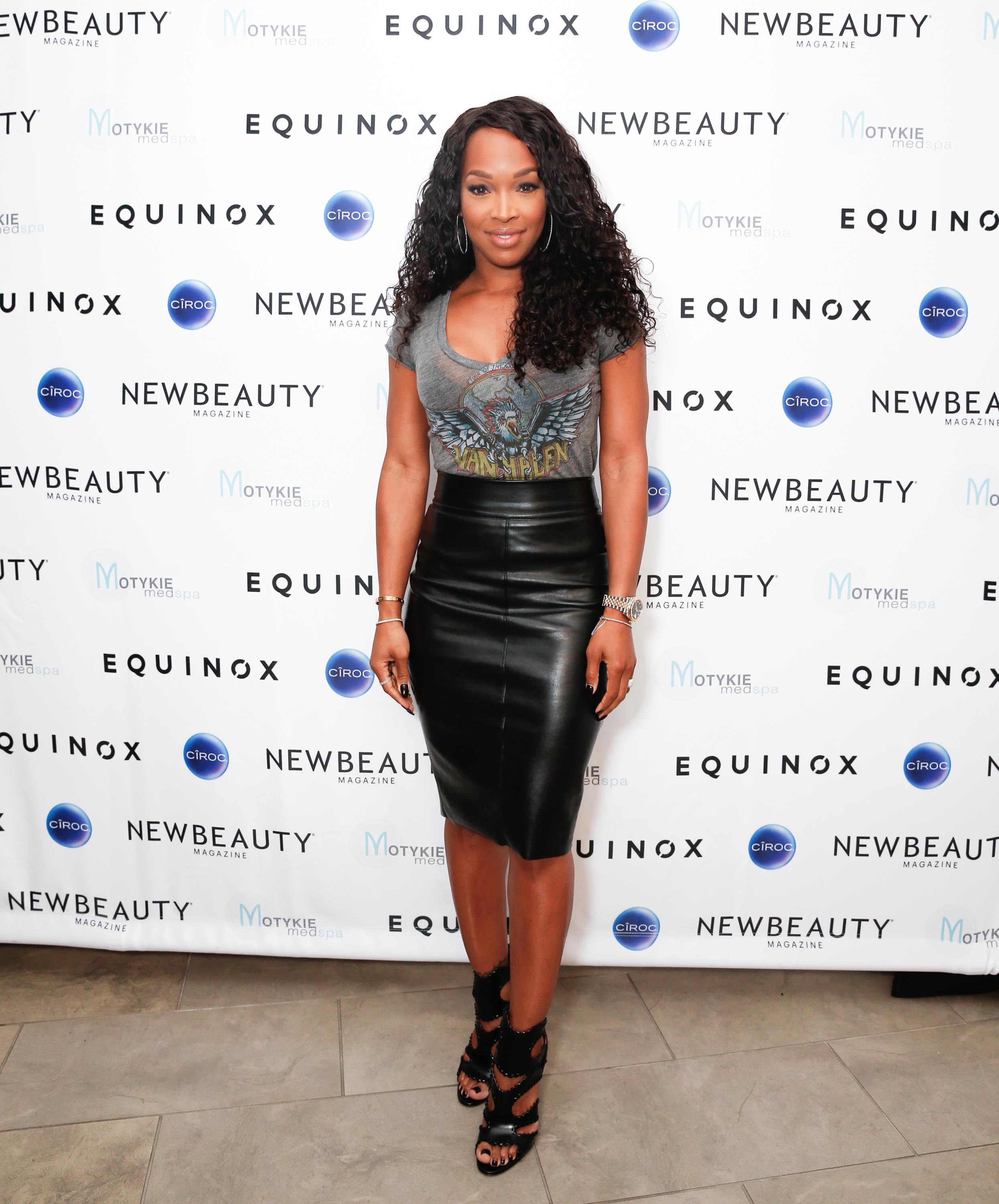 Malika Haqq arrives at the Fall Into Amazing Skin event