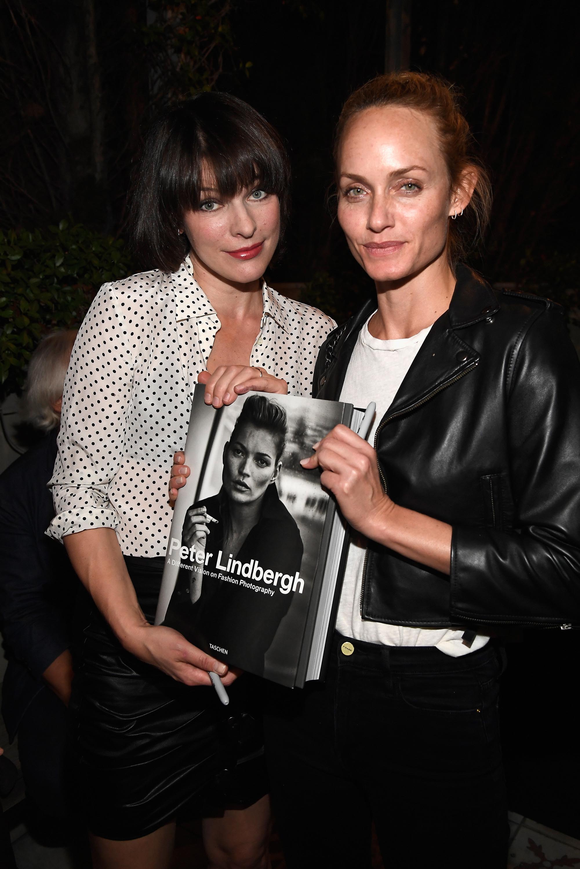 Milla Jovovich attends photographer Peter Lindbergh Book Signing