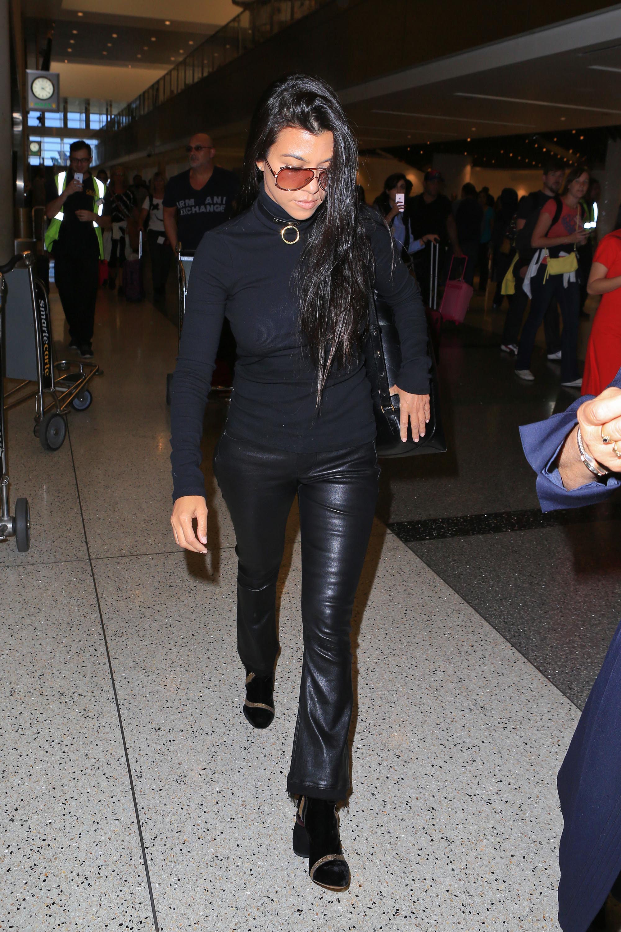 Kourtney Kardashian is seen at LAX
