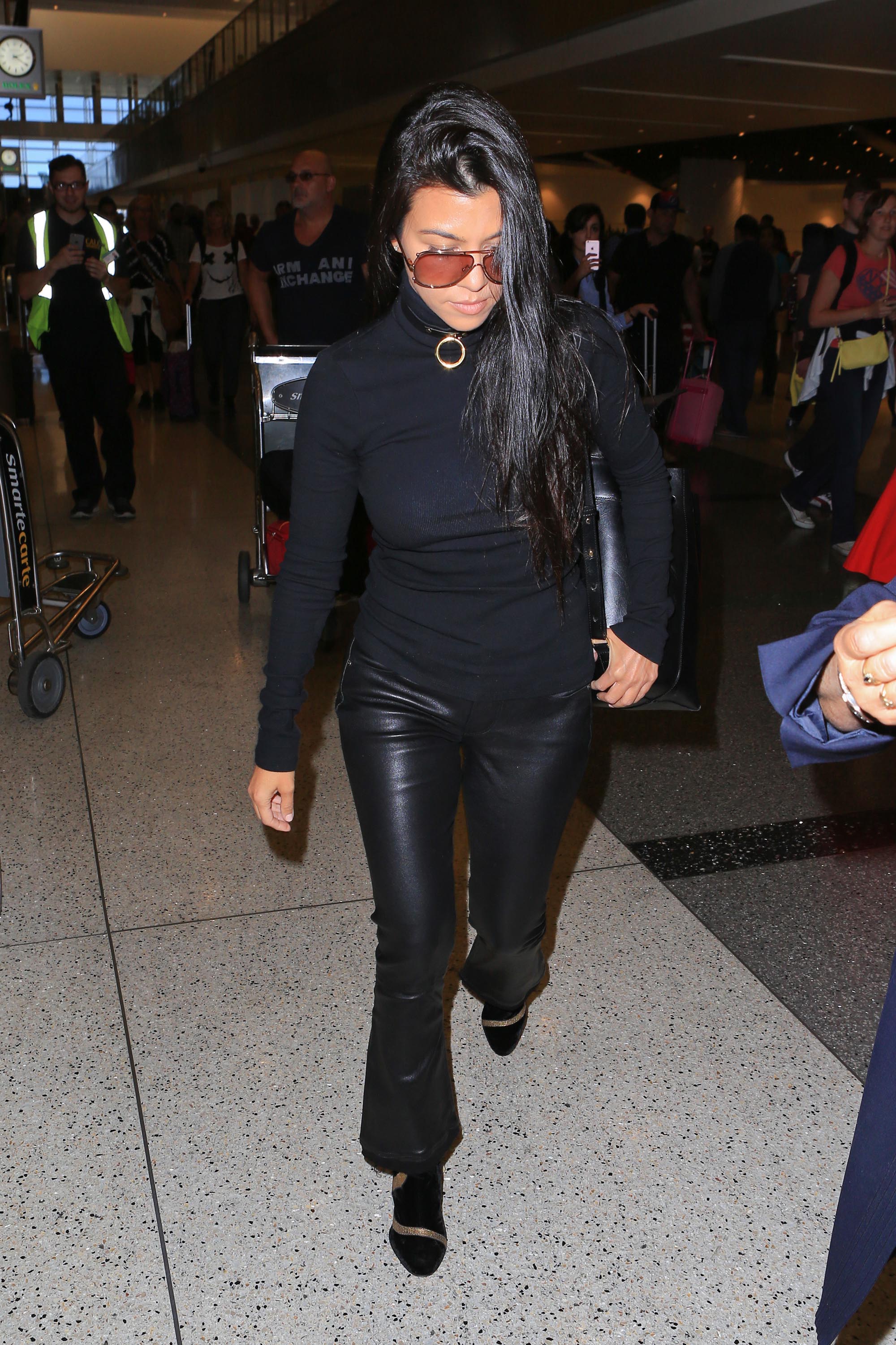 Kourtney Kardashian is seen at LAX
