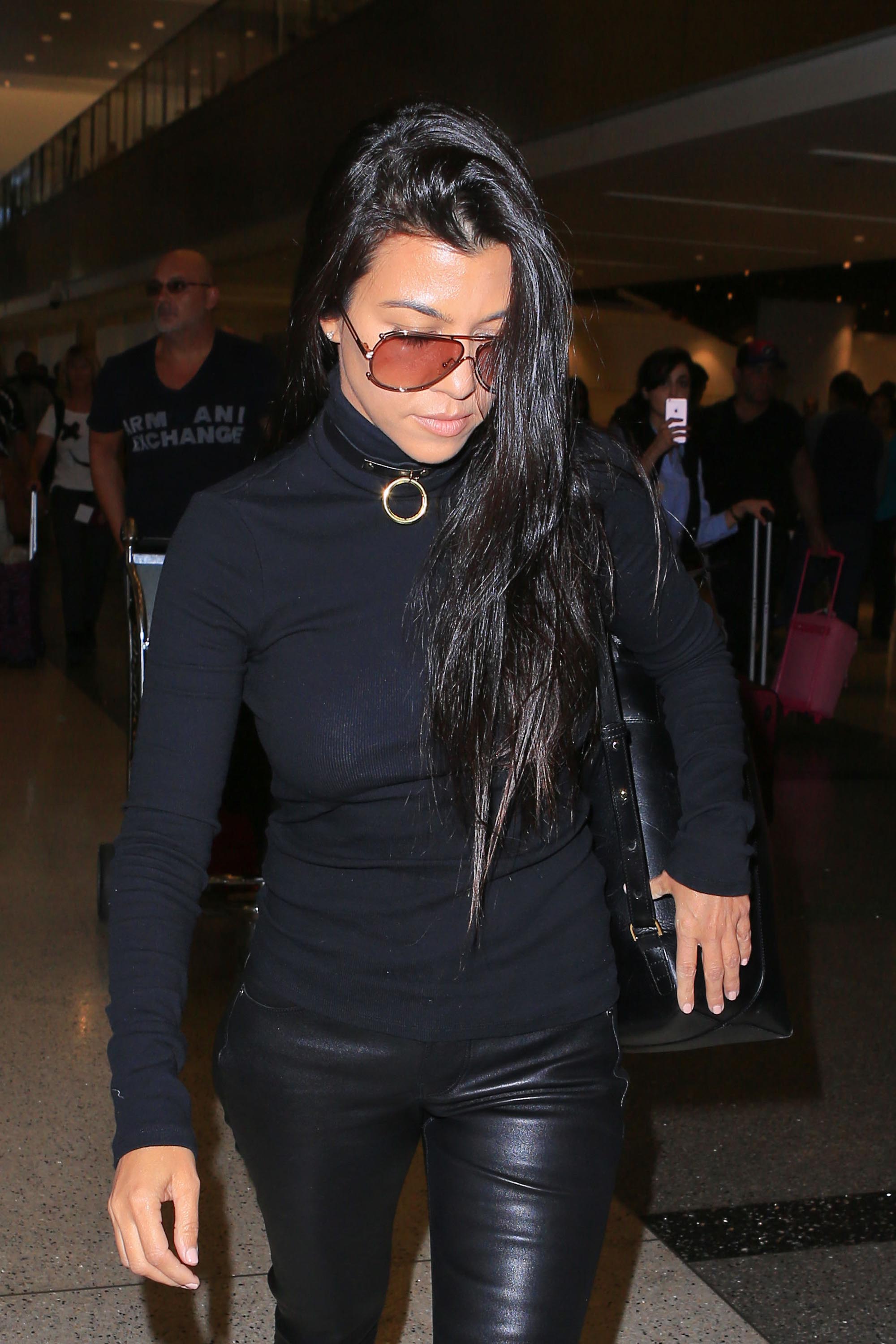 Kourtney Kardashian is seen at LAX