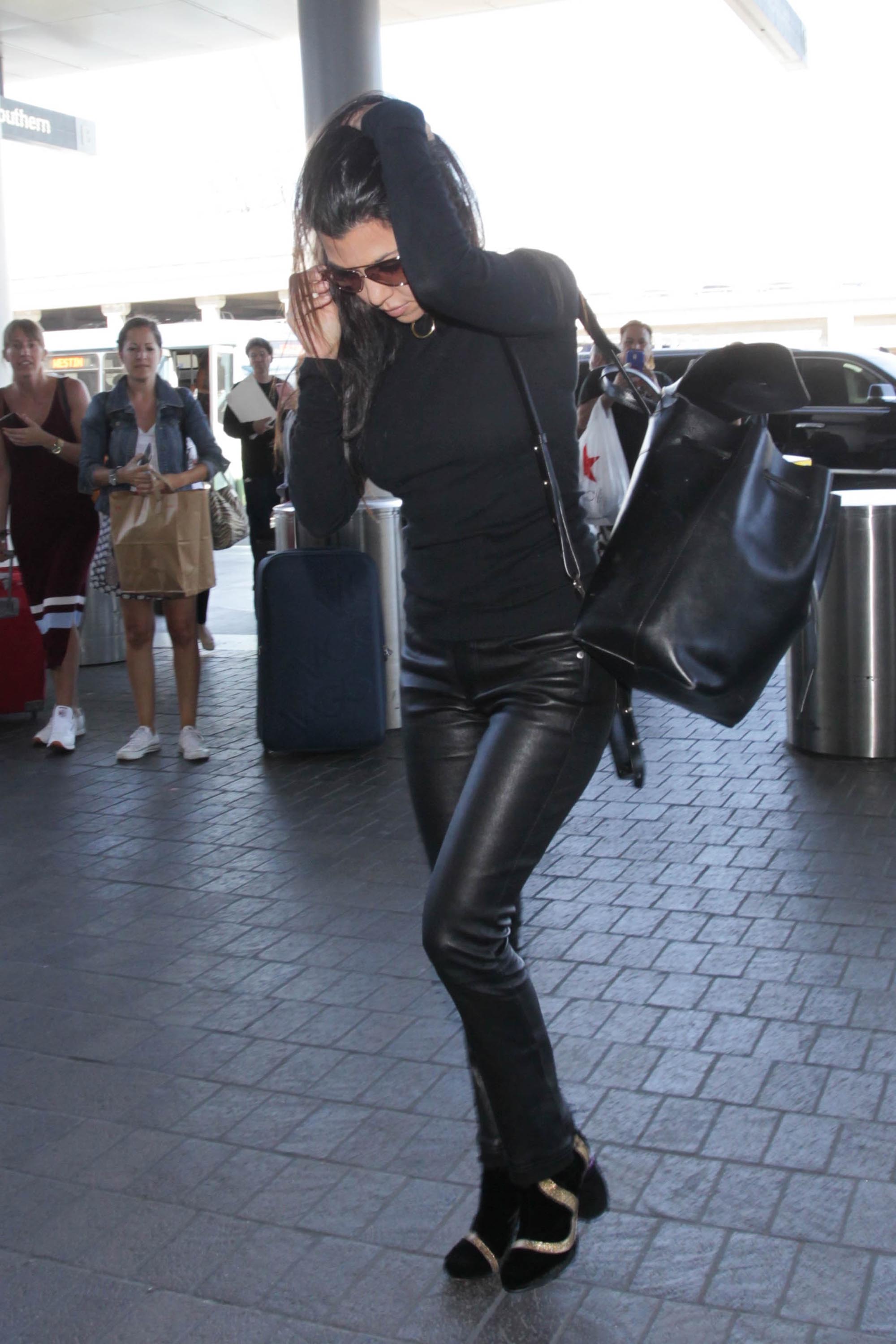 Kourtney Kardashian is seen at LAX