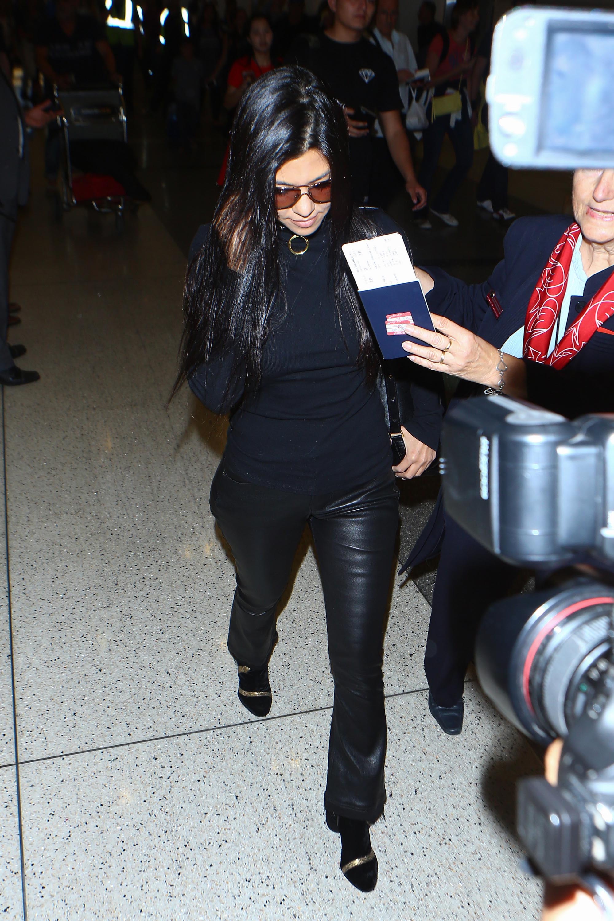 Kourtney Kardashian is seen at LAX