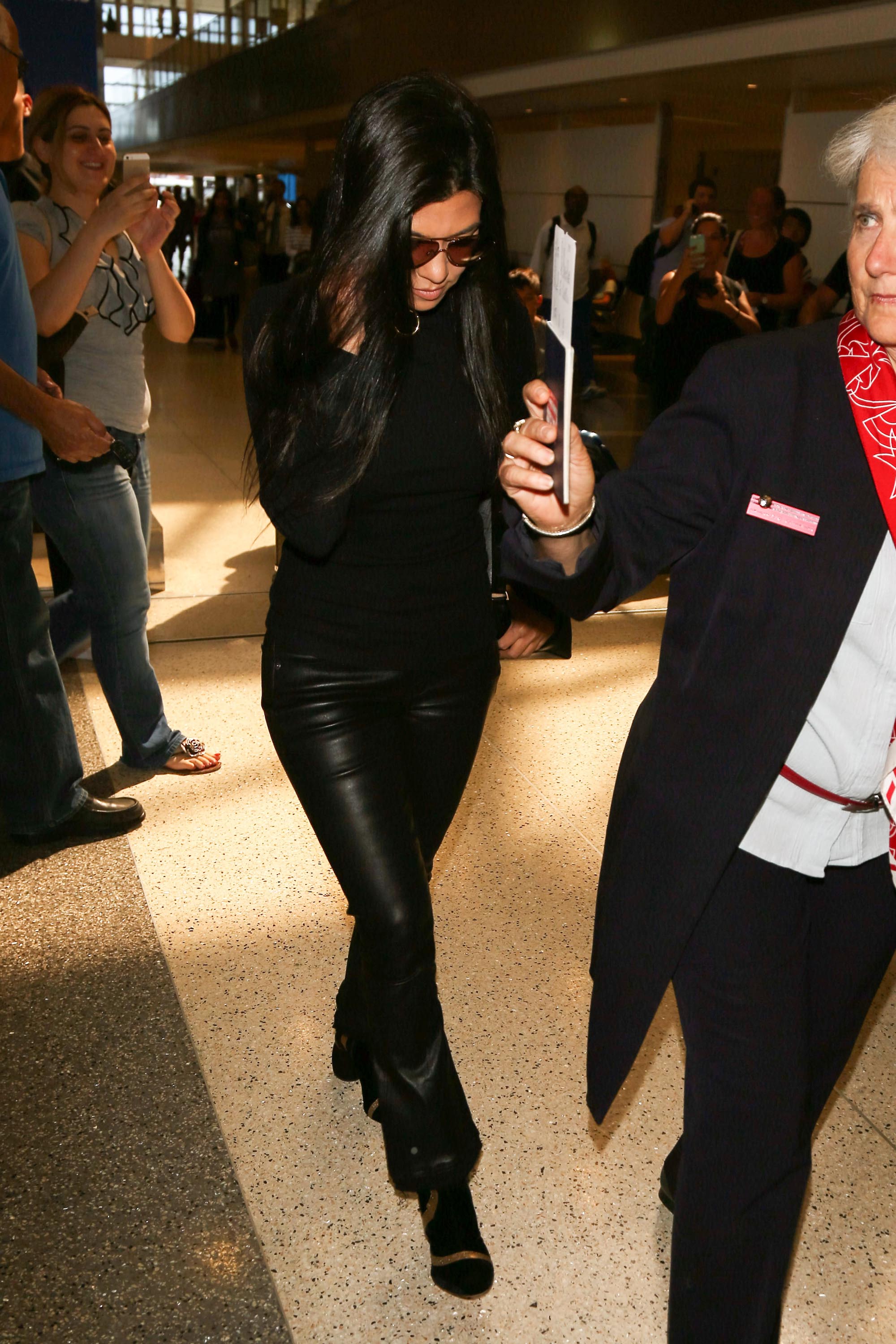 Kourtney Kardashian is seen at LAX