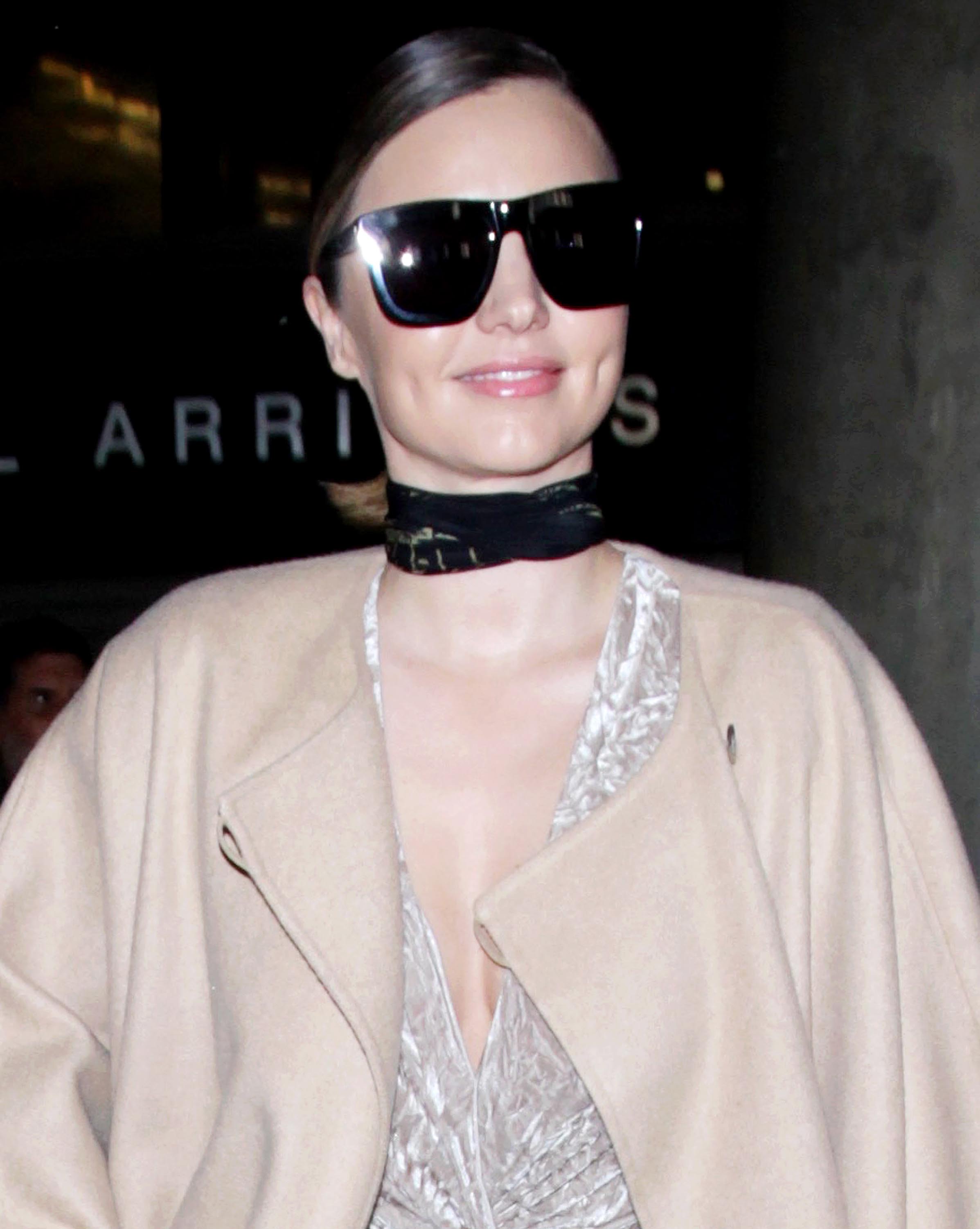 Miranda Kerr seen at Charles-de-Gaulle & LAX airports