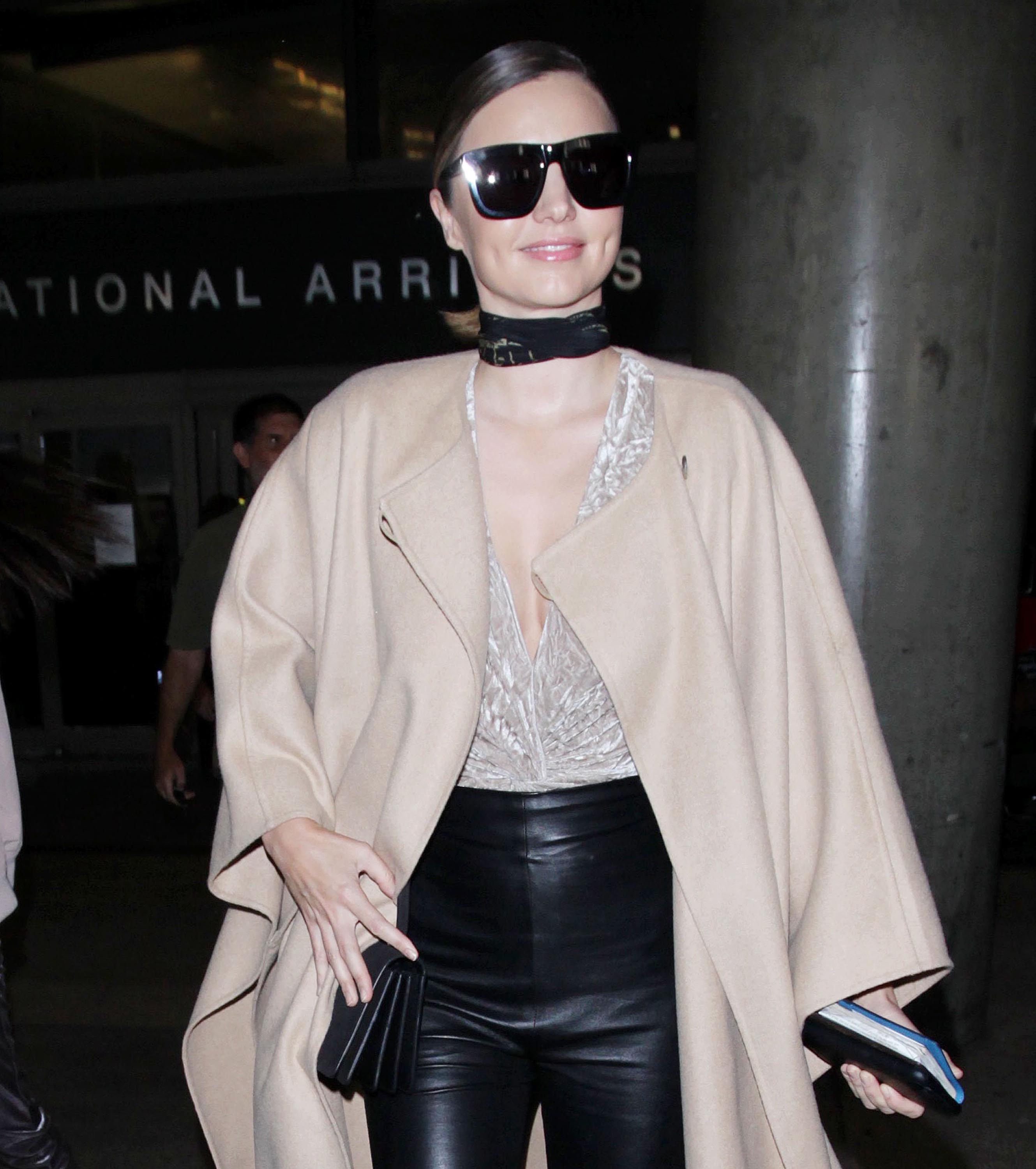 Miranda Kerr seen at Charles-de-Gaulle & LAX airports