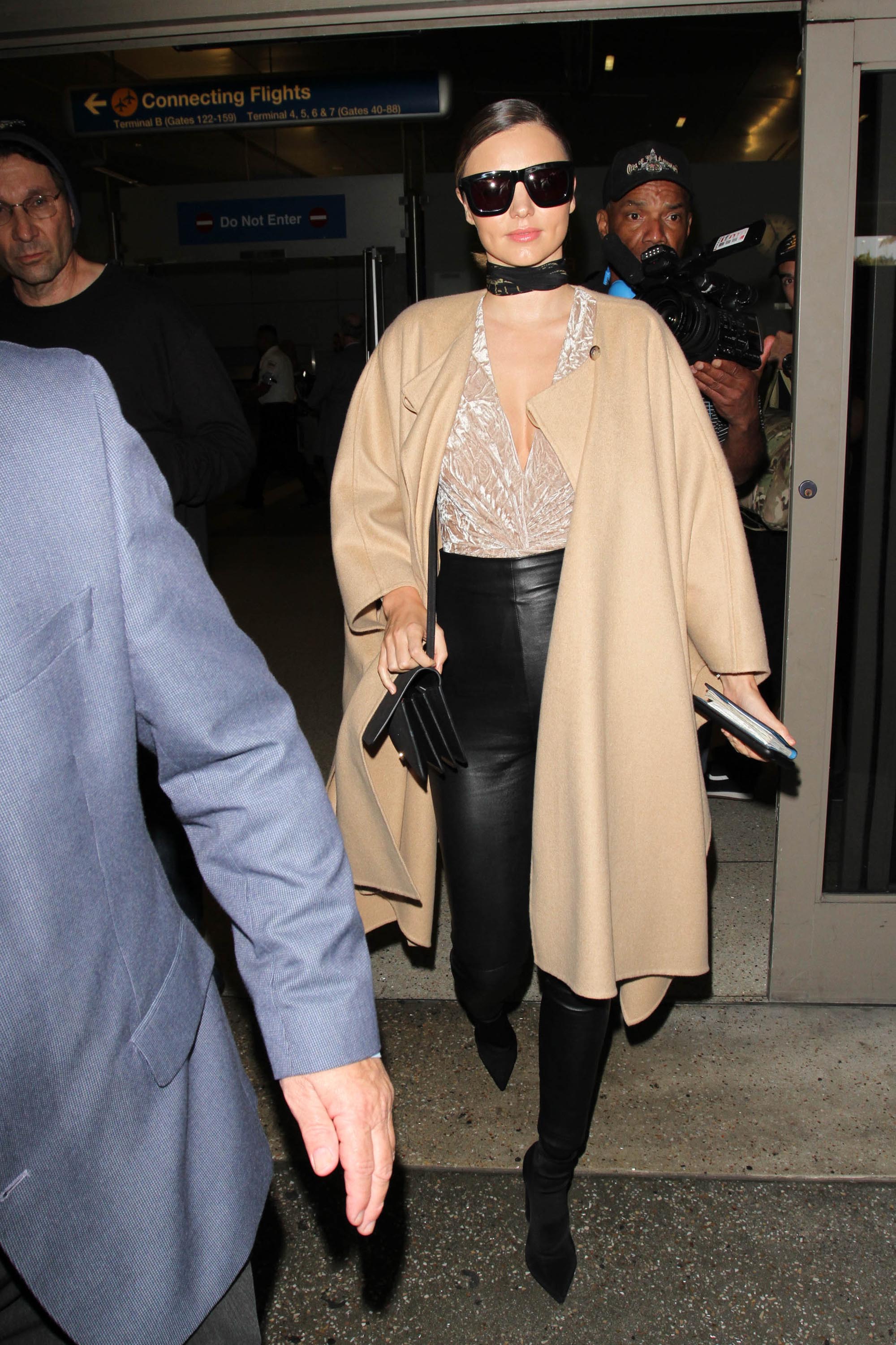 Miranda Kerr seen at Charles-de-Gaulle & LAX airports