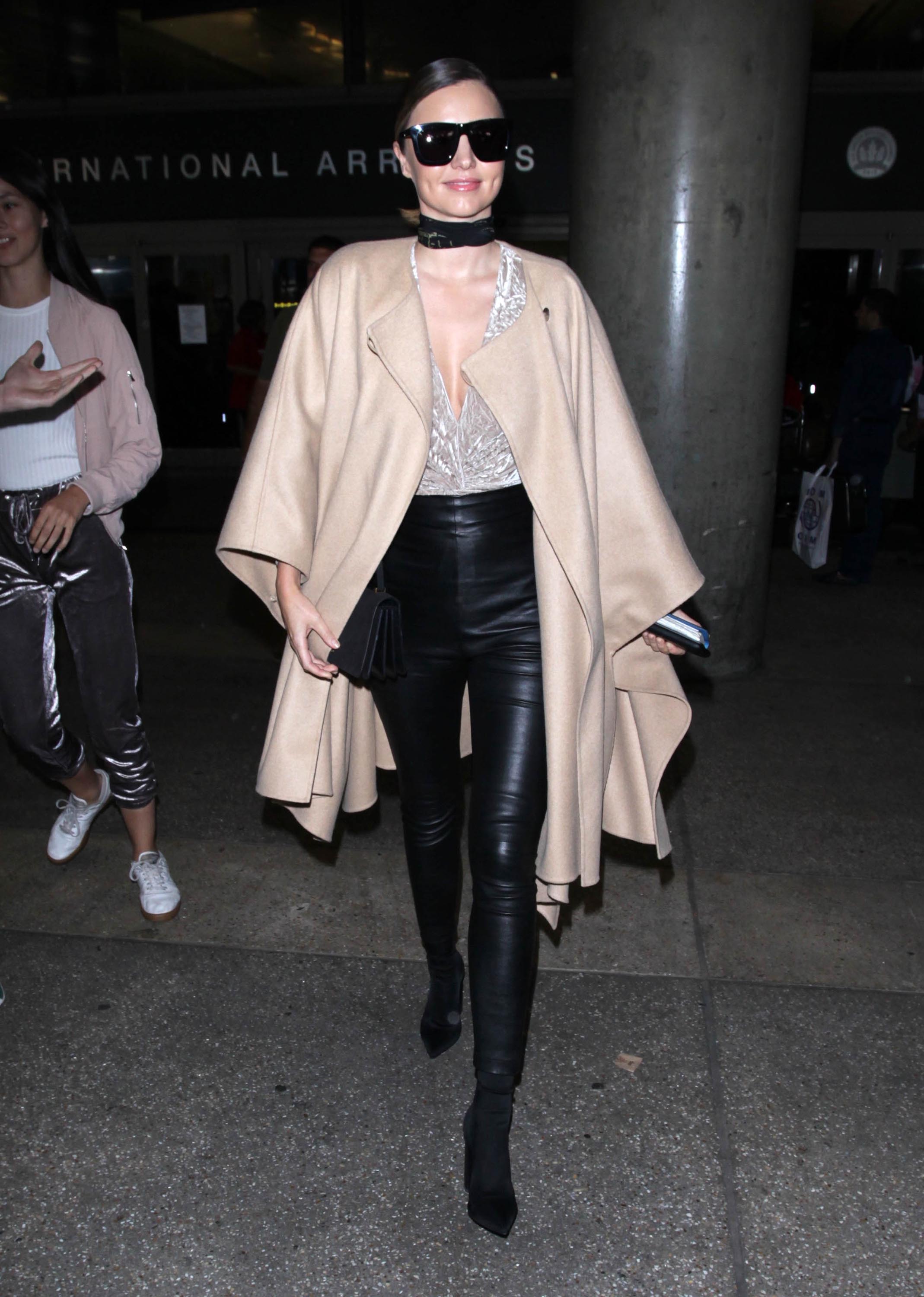 Miranda Kerr seen at Charles-de-Gaulle & LAX airports