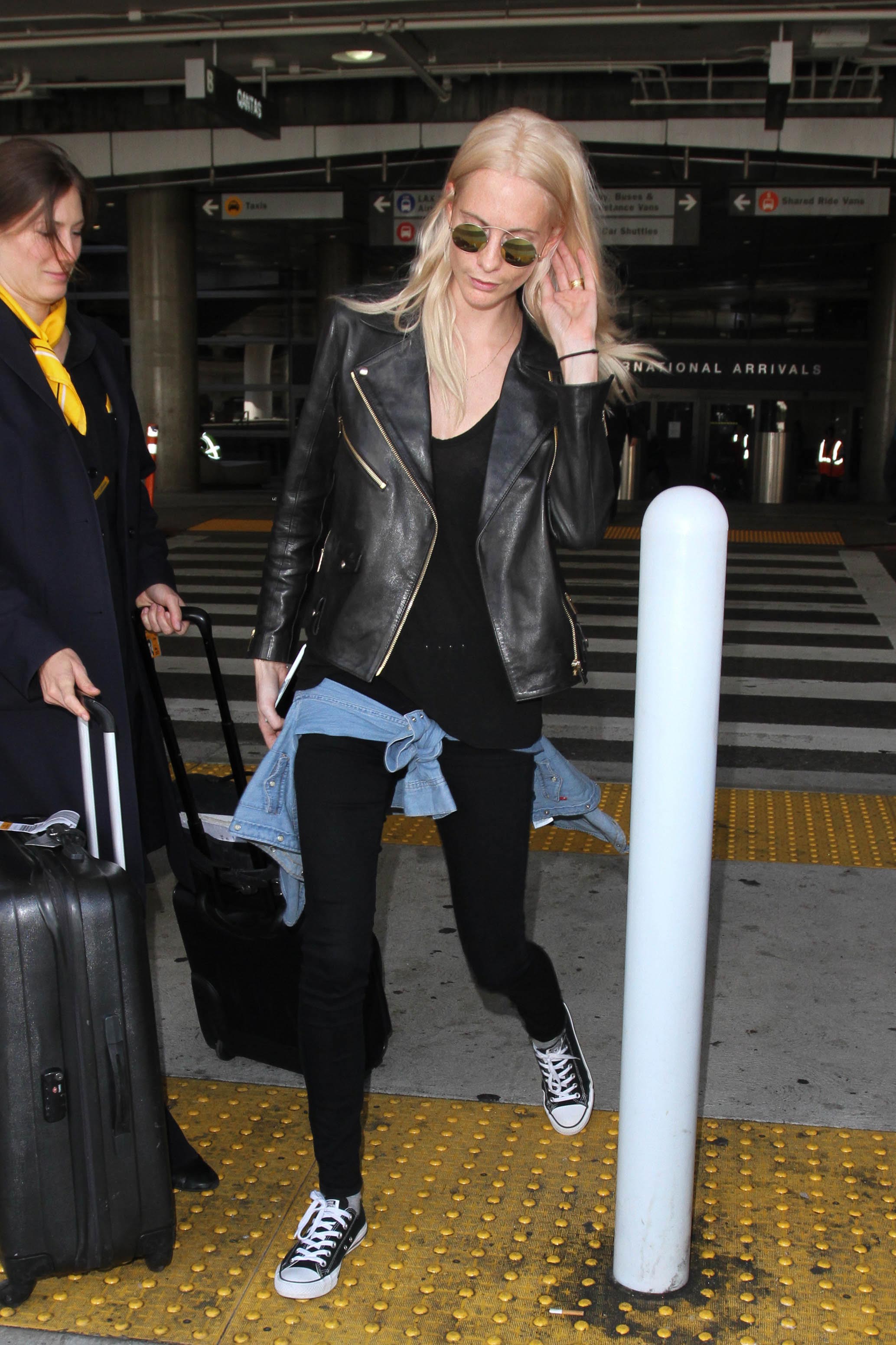 Poppy Delevingne is seen at LAX