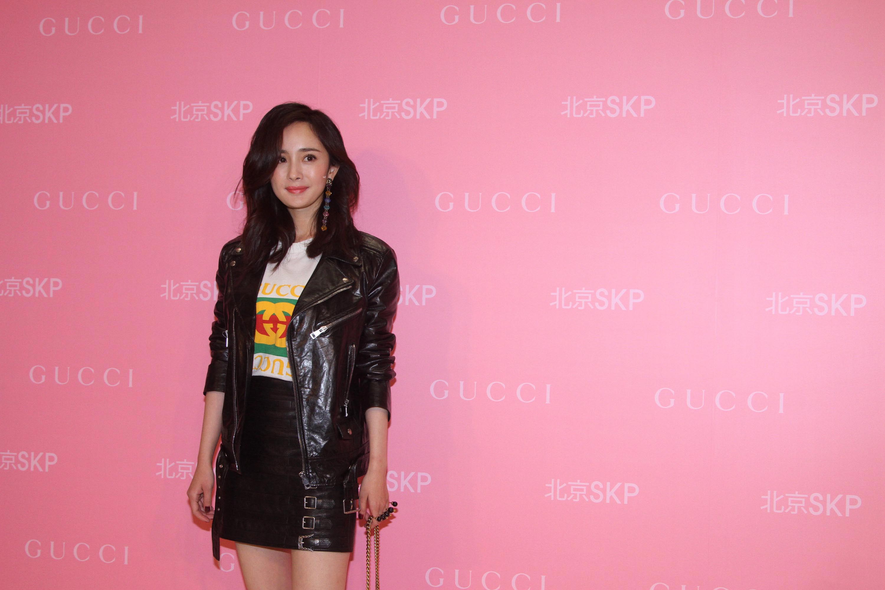 Yang Mi attends an opening ceremony of Shin Kong Place flagship store