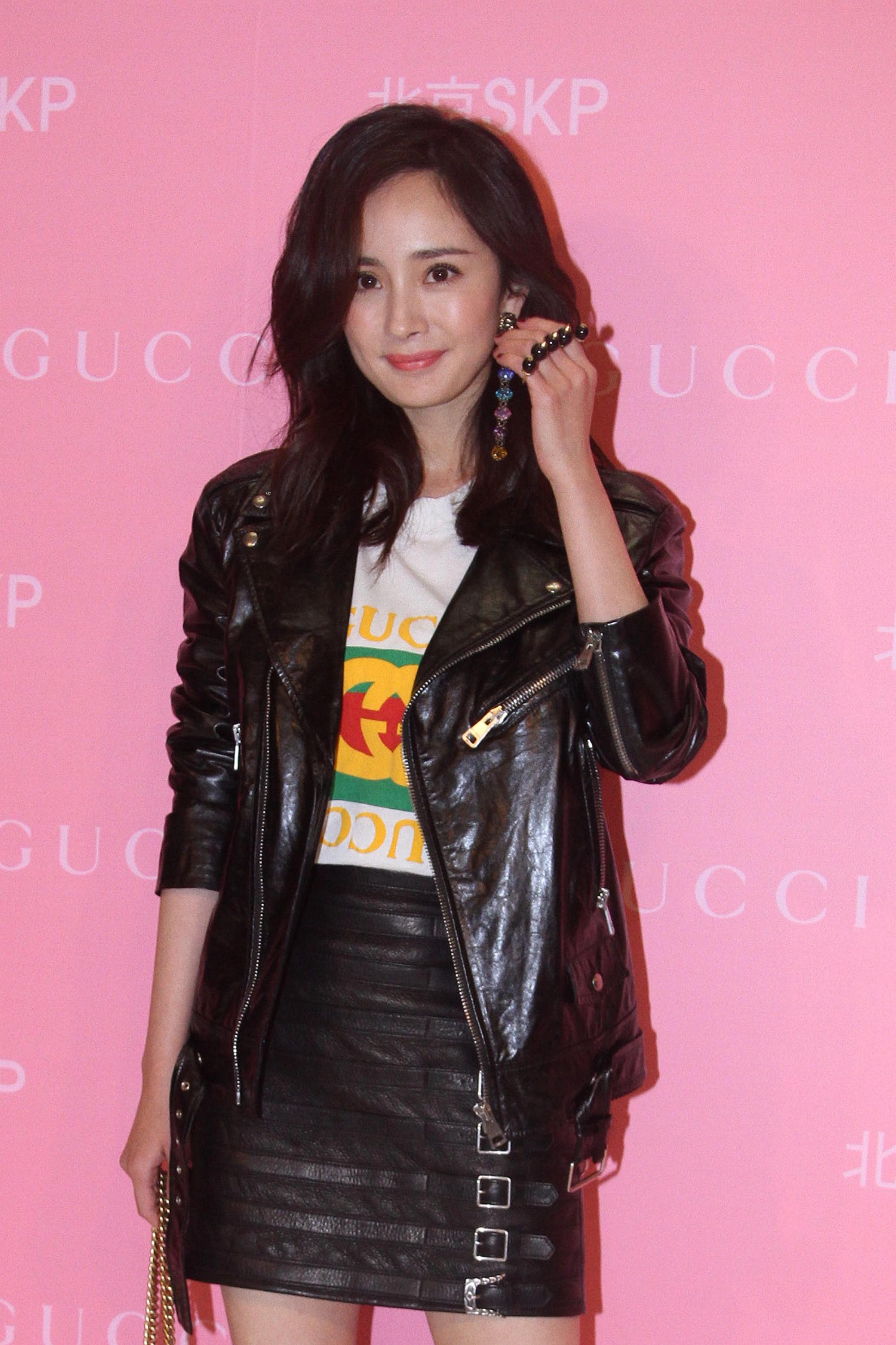 Yang Mi attends an opening ceremony of Shin Kong Place flagship store